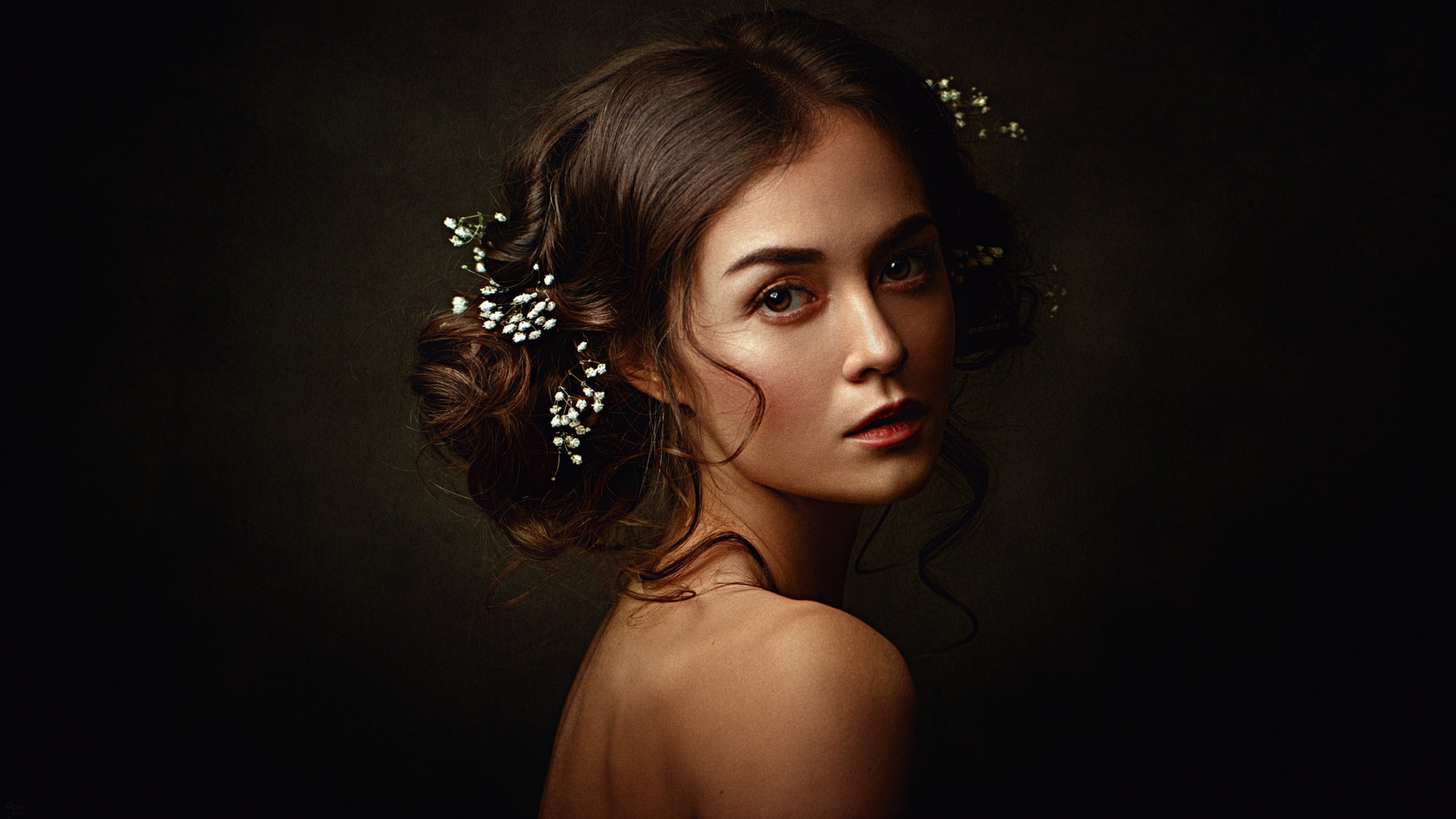 Georgy Chernyadyev, brown eyes, flower in hair, dark, face, looking at viewer, women, simple background, vignette, brunette, model, dark background, portrait, HD Wallpaper