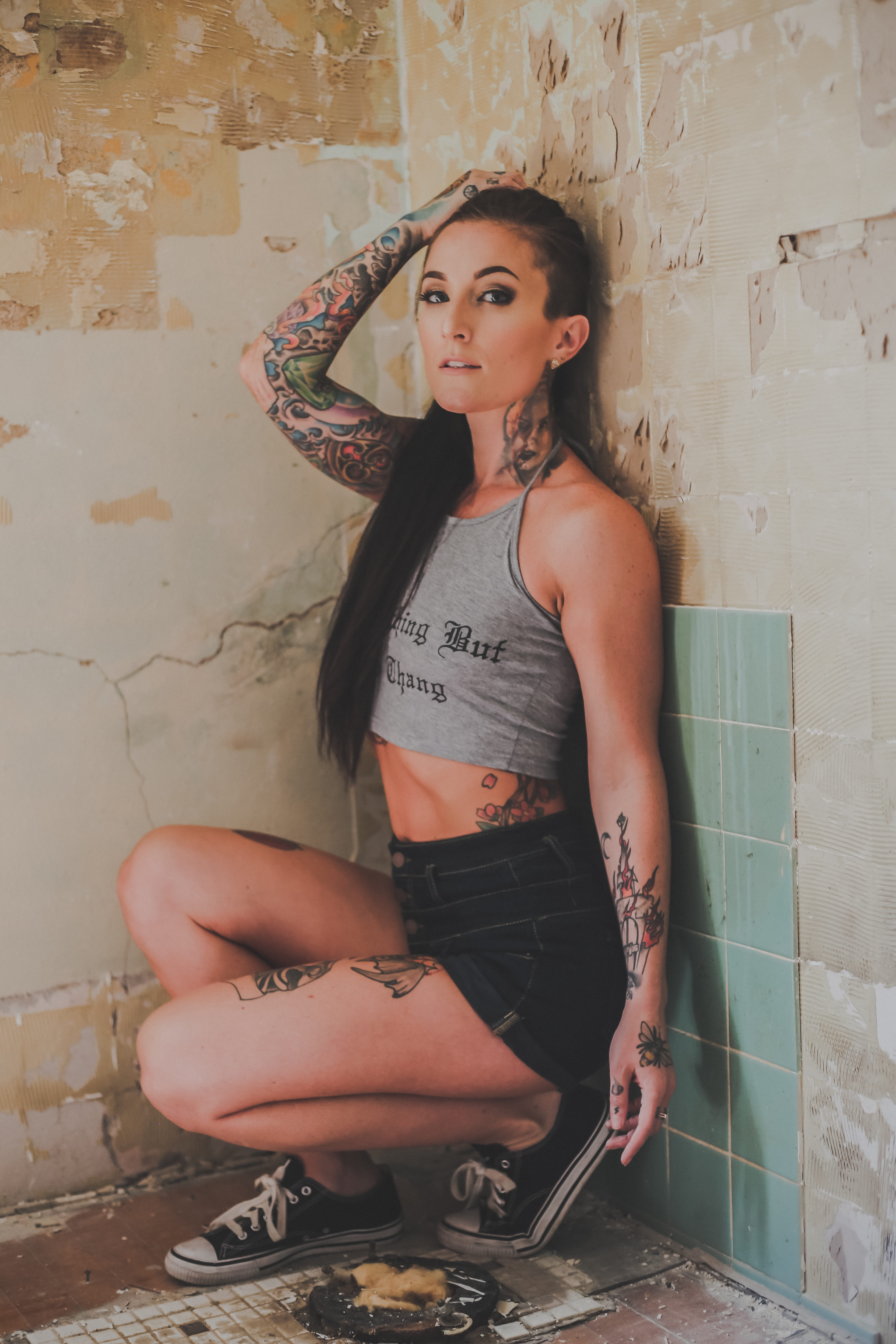 modeling, derelict, one person, sitting, tat, casual clothing, tattoo, lifestyles, female, young adult, wall, woman, fashion, front view, looking at camera, Phone HD Wallpaper