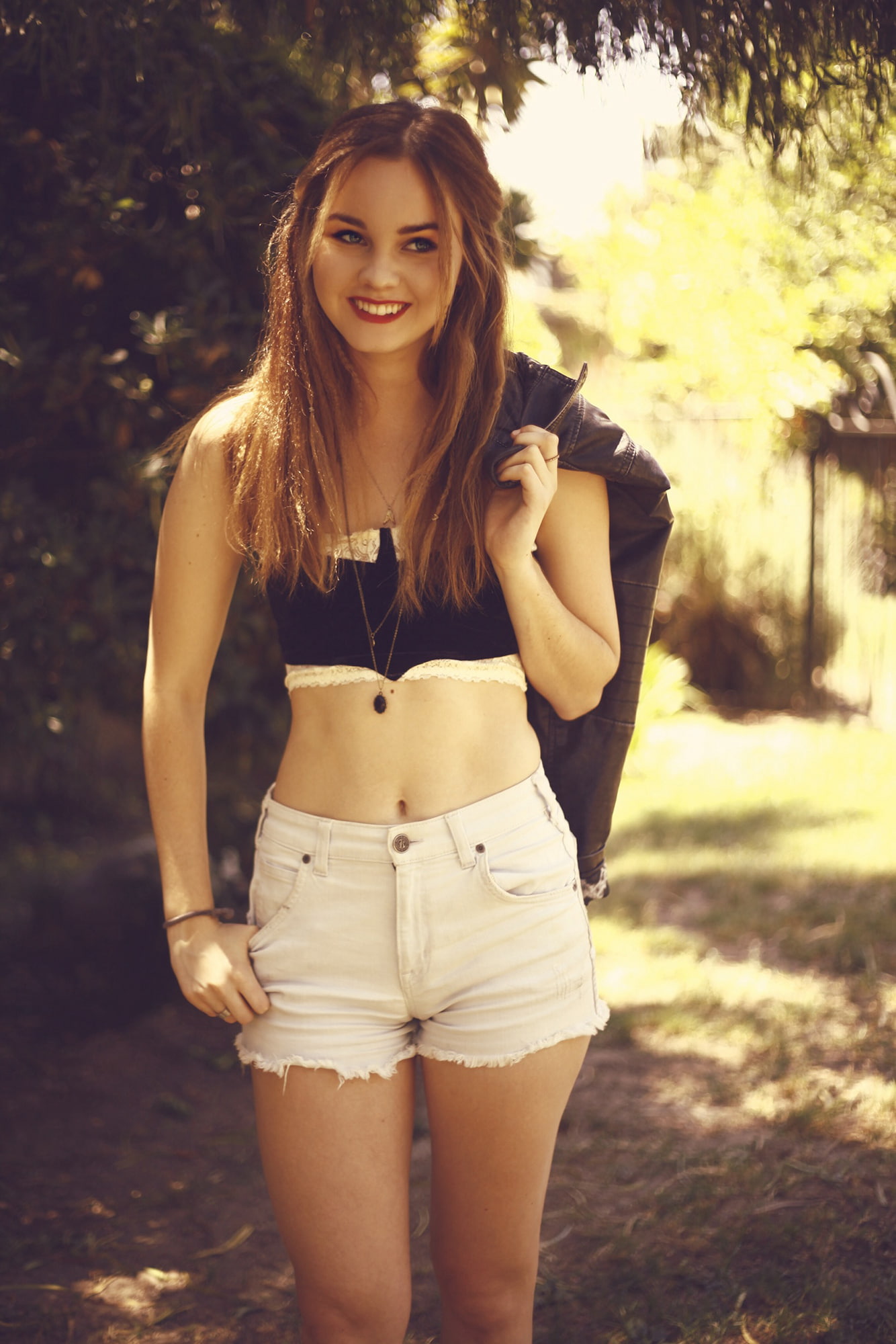 Liana Liberato, actress, smiling, short shorts, shorts, 1080P, happy, leather jackets, women, women outdoors, Phone HD Wallpaper