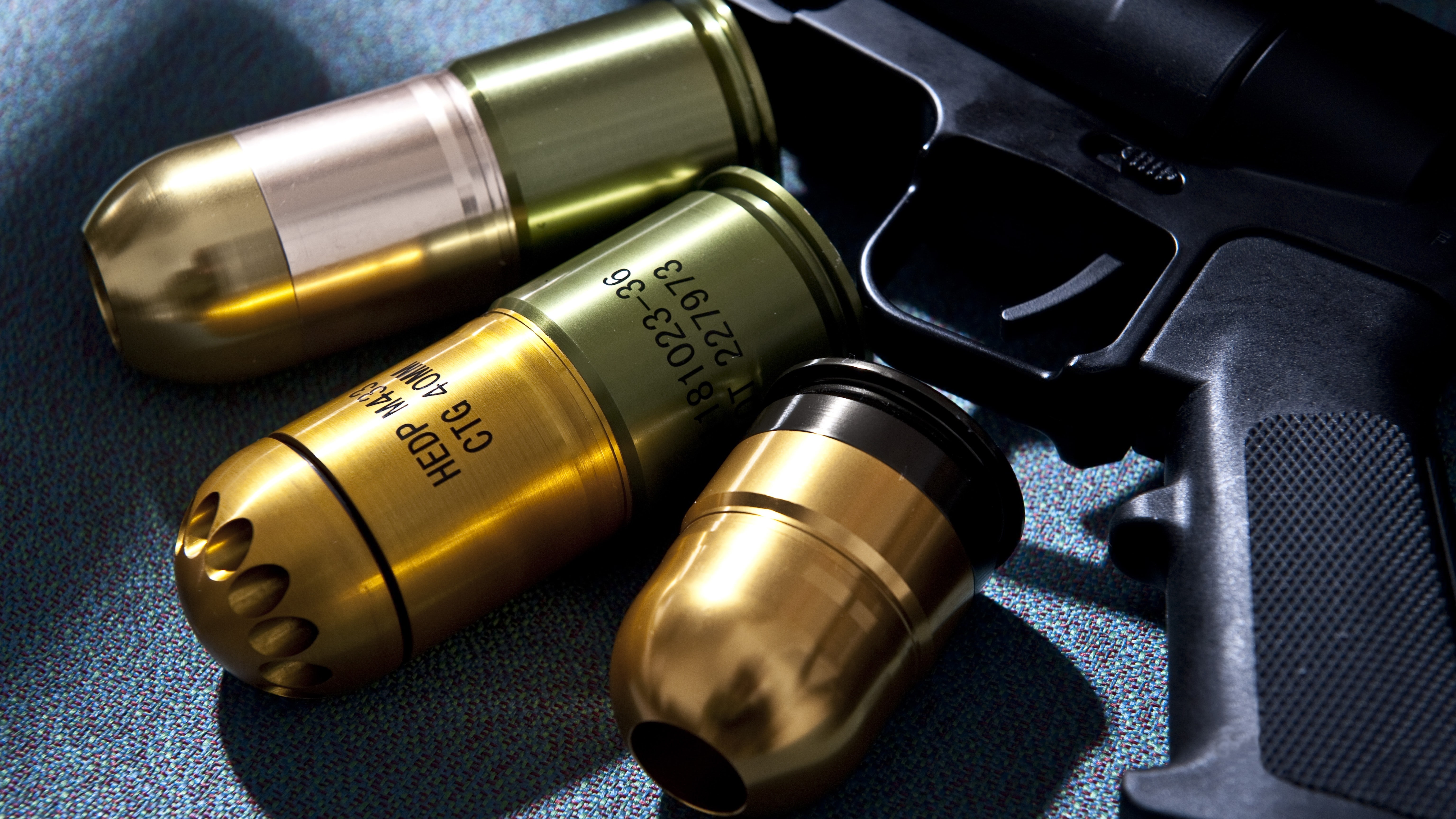 indoors, text, close-up, grenade launchers, still life, studio shot, communication, technology, no people, 5K, ammunition, 40MM Grenade, music, equipment, HD Wallpaper