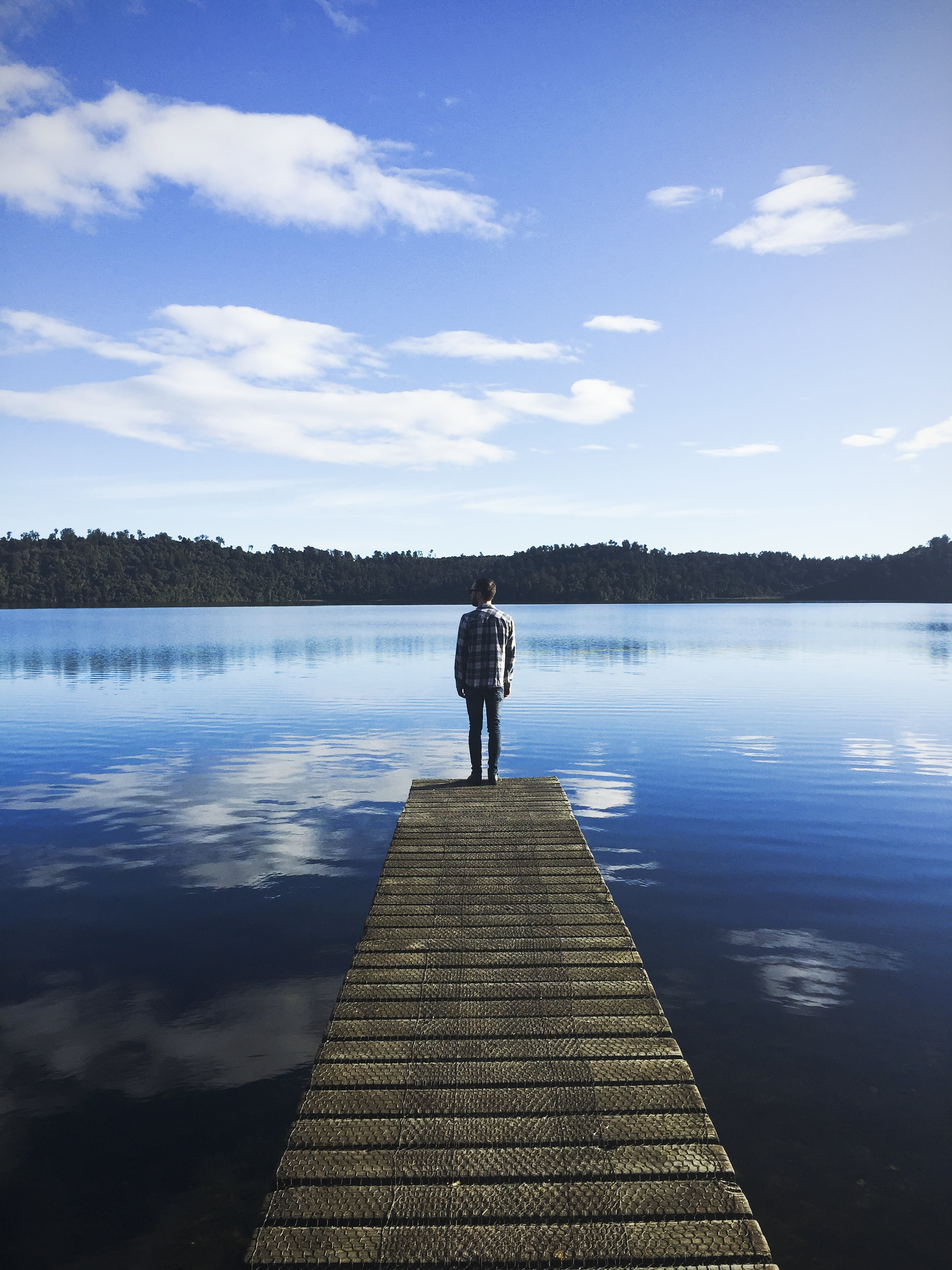 shirt, sky, landscape, pathway, cloud - sky, dock, standing, jetty, clouds, tranquil scene, man, scenics - nature, one person, real people, water, wooden, Phone HD Wallpaper