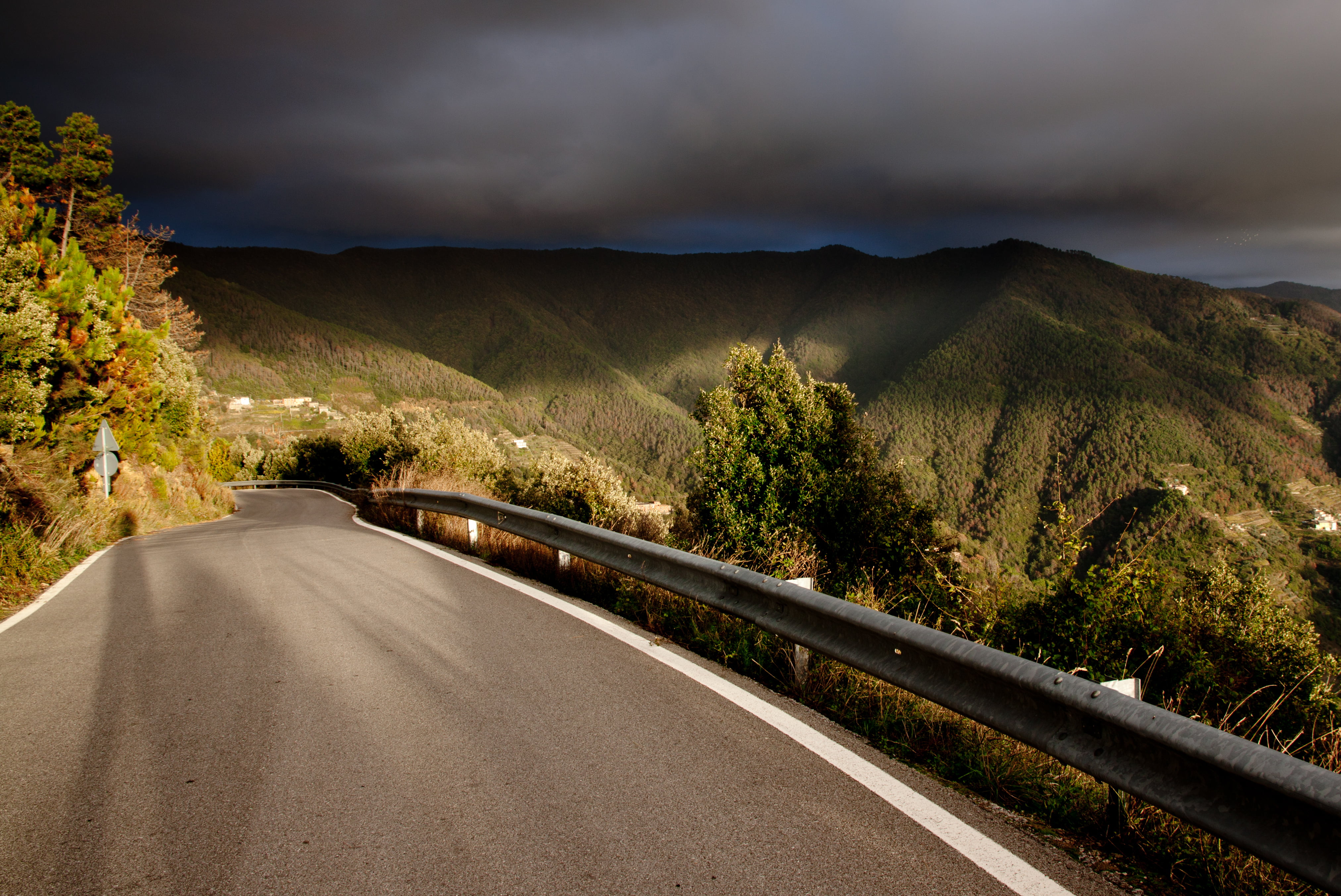 concrete road, rural Scene, curve, sky, green, travel, sombre, outdoors, street, asphalt, near, no People, gear, dark, summer, hill, Road to, tree, scenics, HD Wallpaper