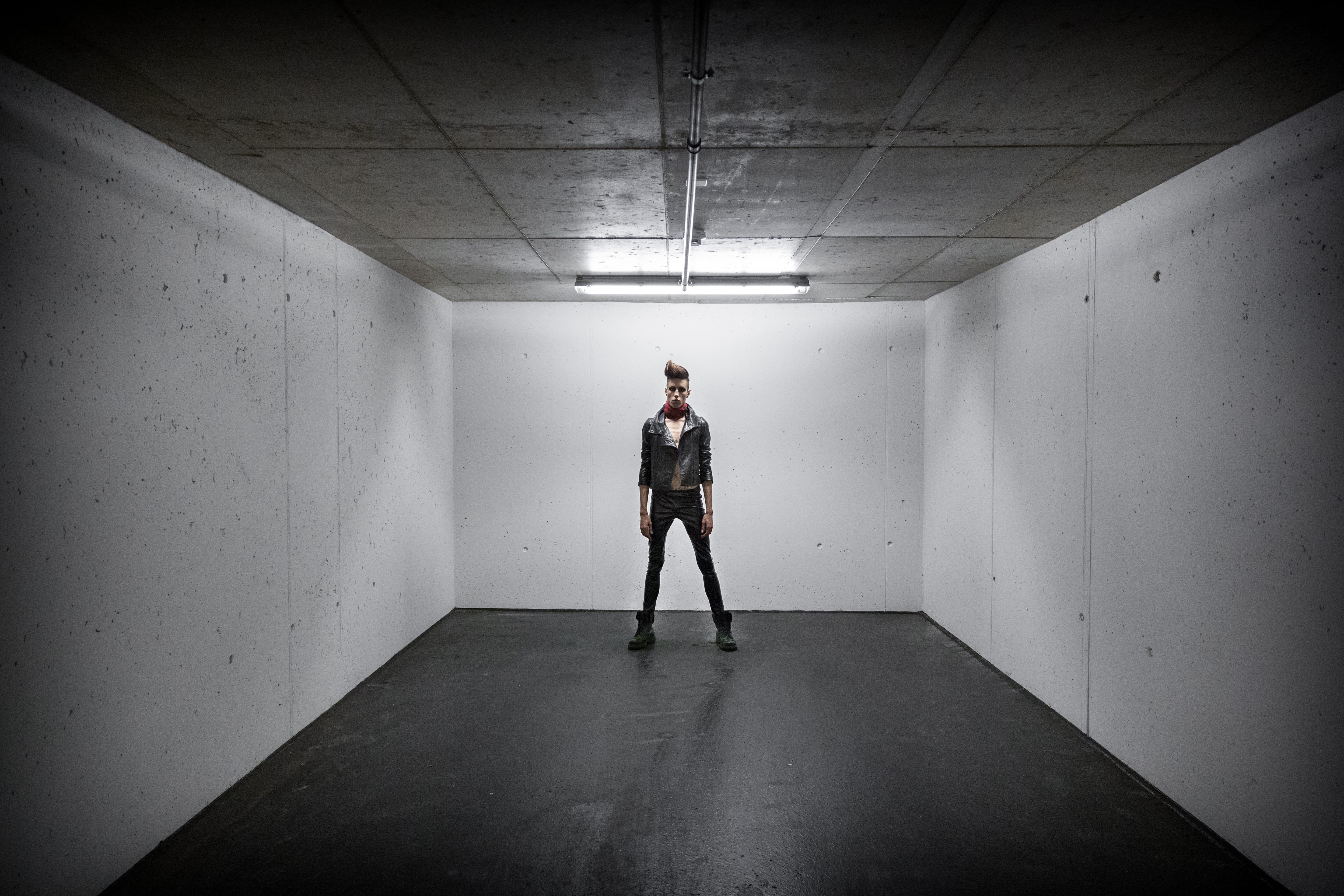 front view, 5K, young adult, man, ceiling, inside, parking garage, studio, standing, clothing, leisure activity, full length, adult, box, person, building, HD Wallpaper