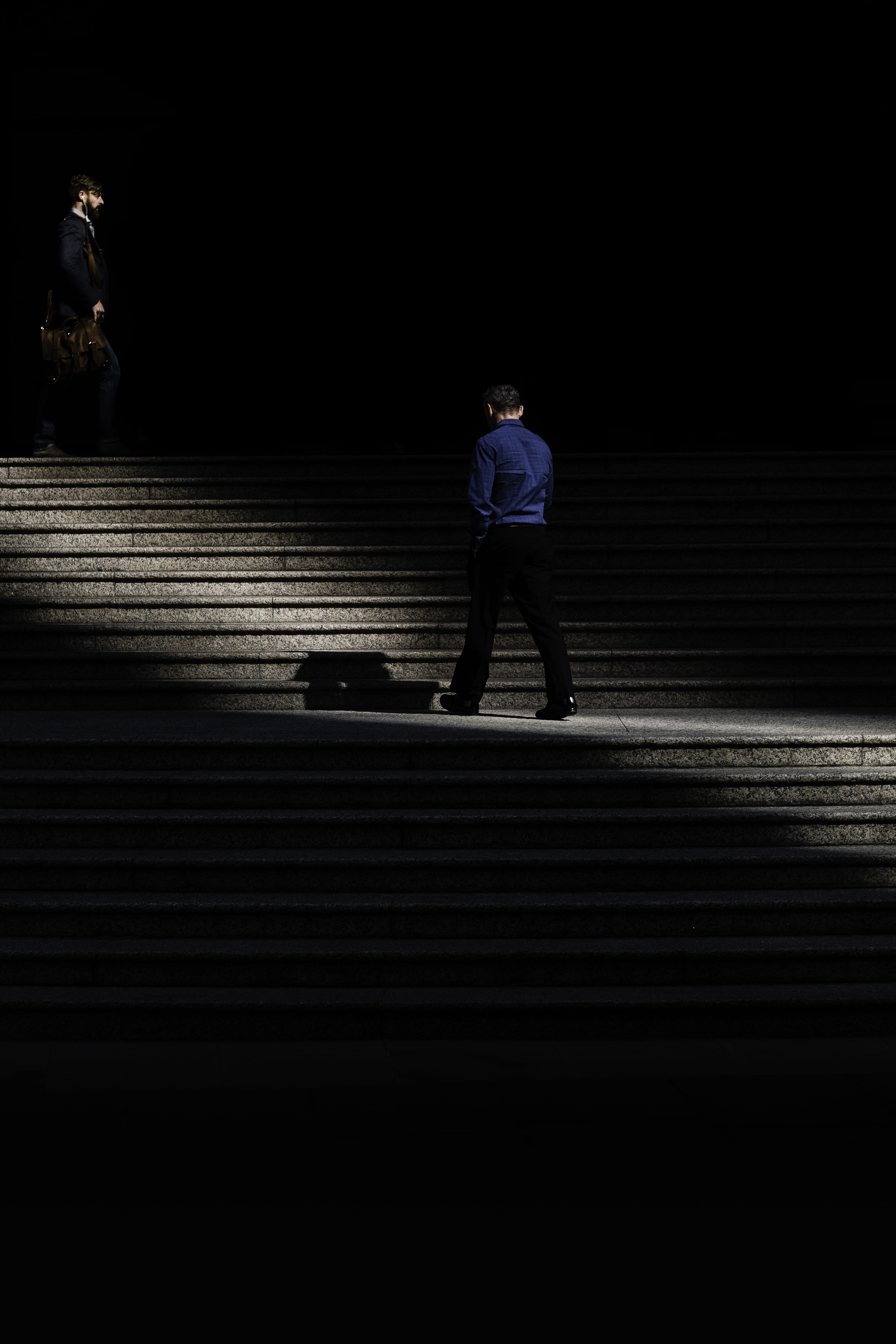 person, street, men, human, walking, levels, architecture, footpath, illuminated, full length, city life, city, negative space, light, rear view, 5K, leisure activity, Phone HD Wallpaper