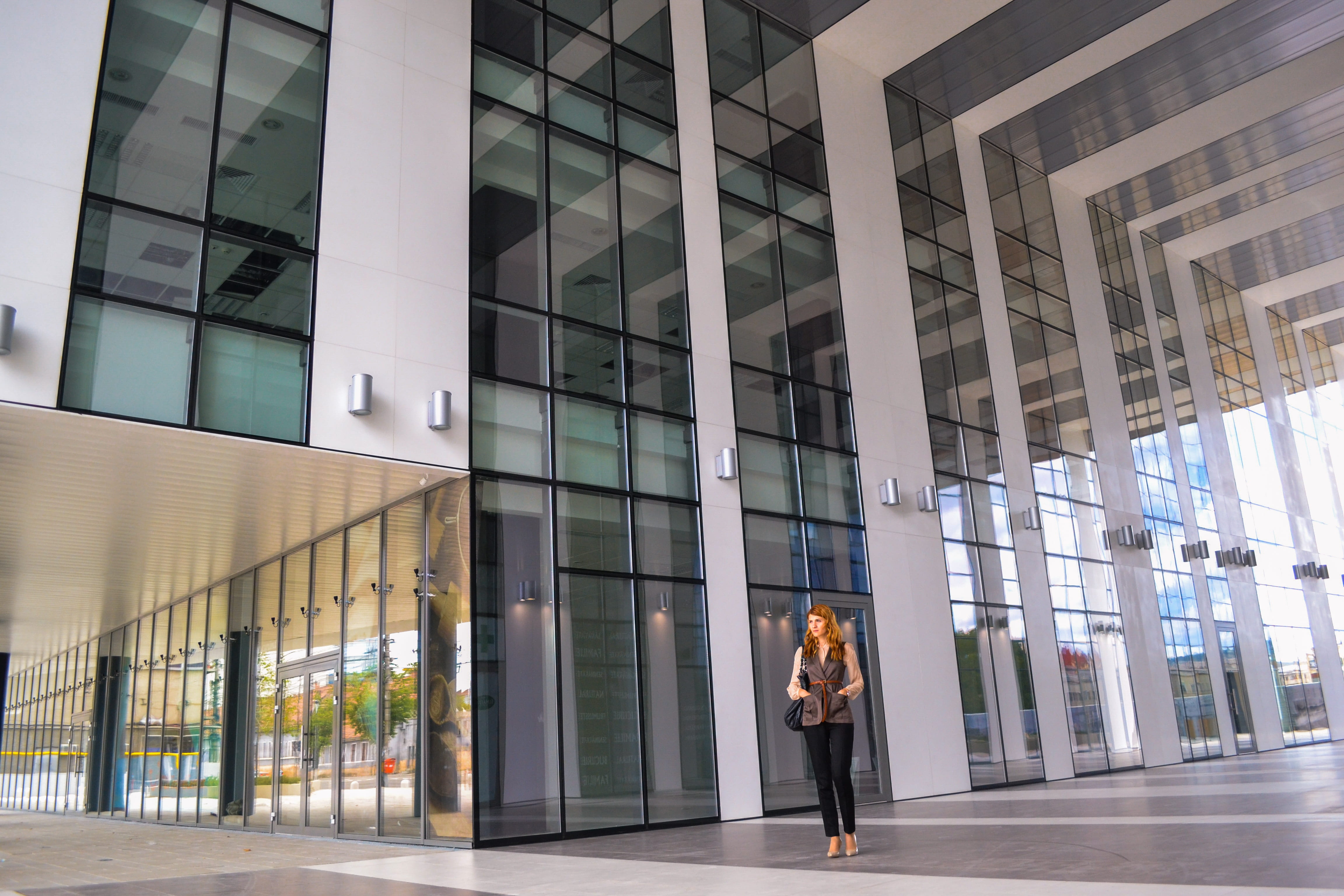 professional, real people, one person, front, street, modern, glass - material, beautiful, woman, day, young adult, building, business, standing, boss, HD Wallpaper