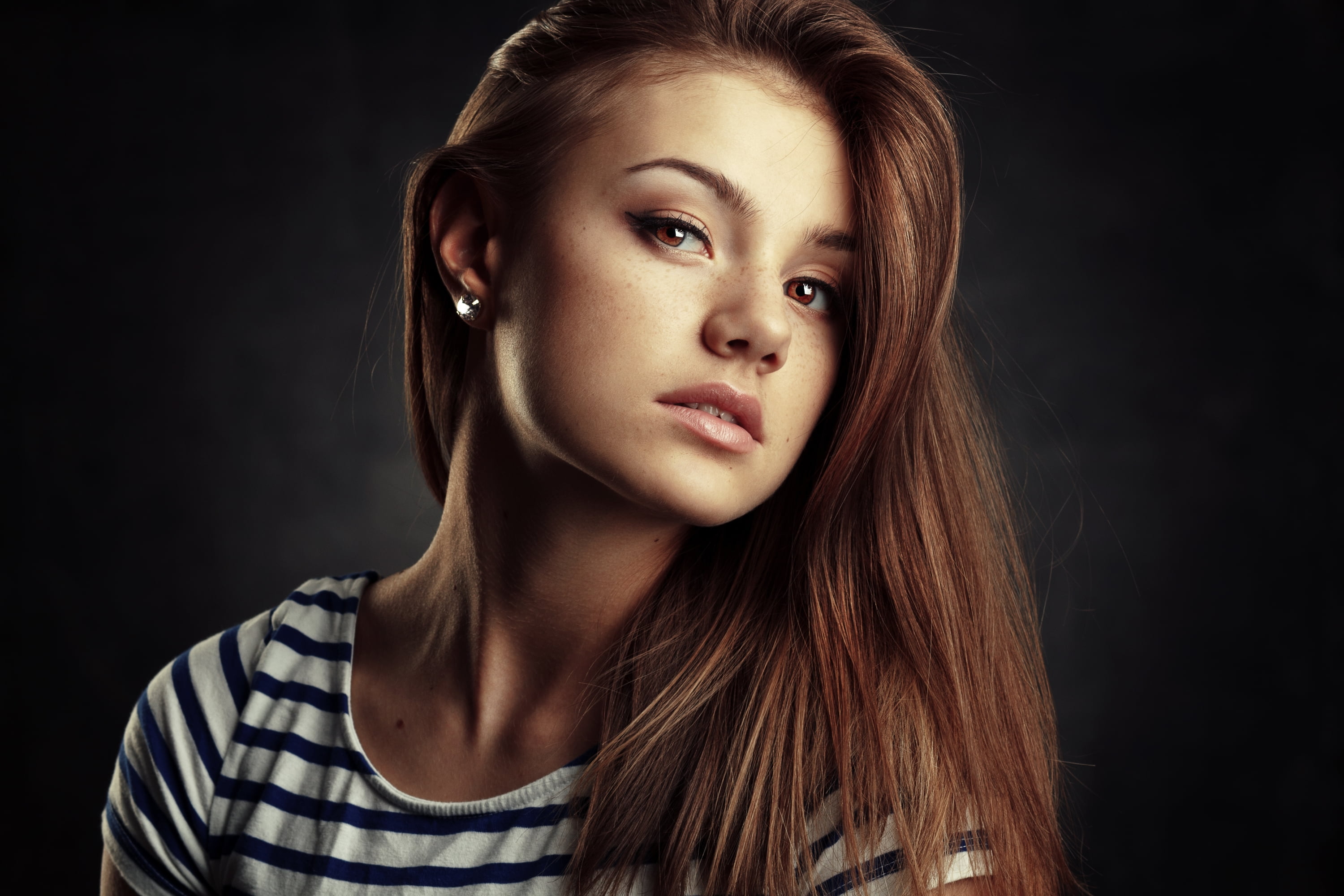 face, women, brown eyes, earring, eyeliner, brunette, striped clothing, indoors, T-shirt, portrait, 2K, dark background, women indoors, Evgeniy Bulatov, HD Wallpaper