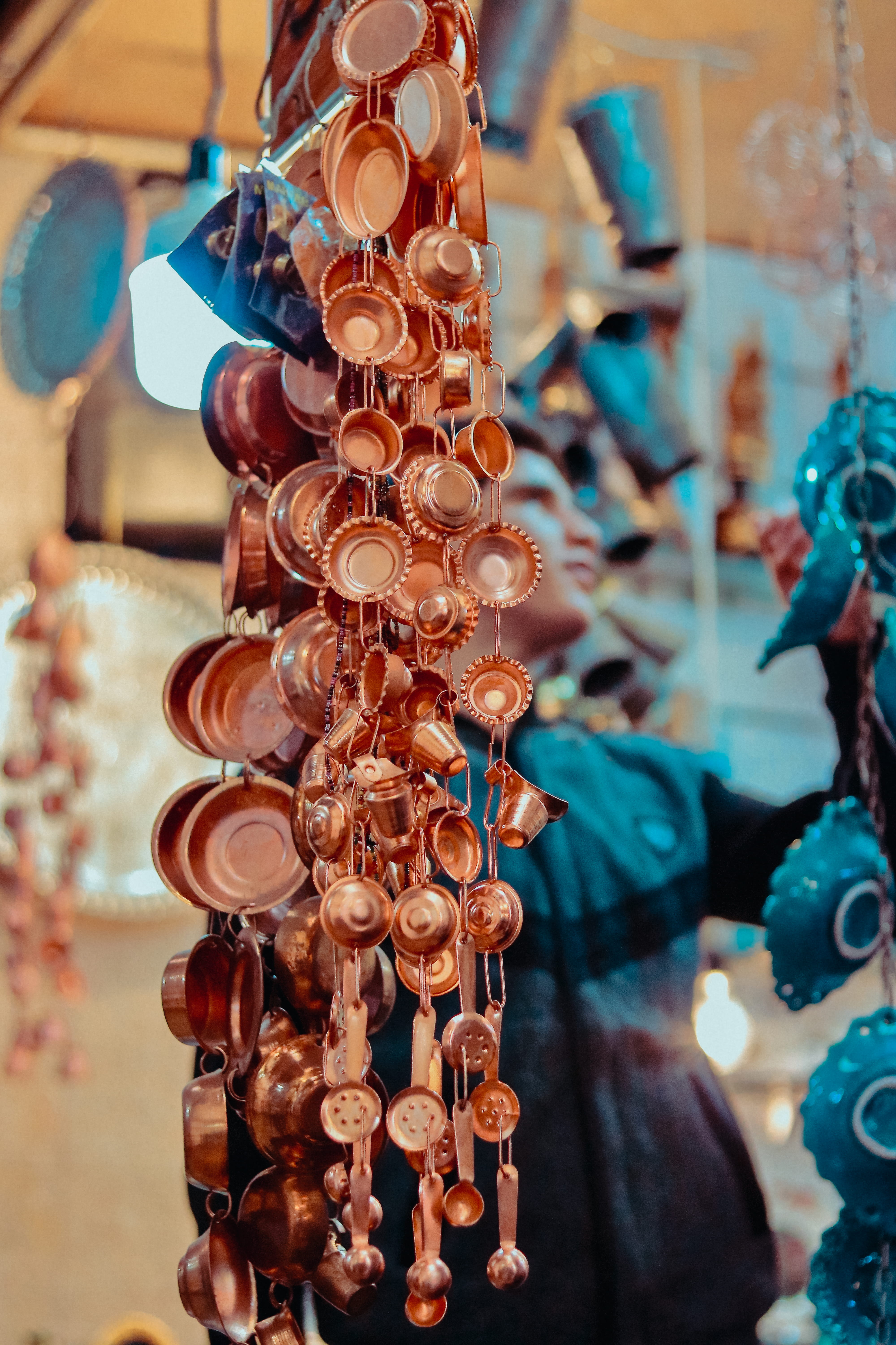 person, focus on foreground, variation, sale, for sale, accessory, retail, amusement park, bronze, abundance, festival, crowd, chime, close-up, photography, Phone HD Wallpaper