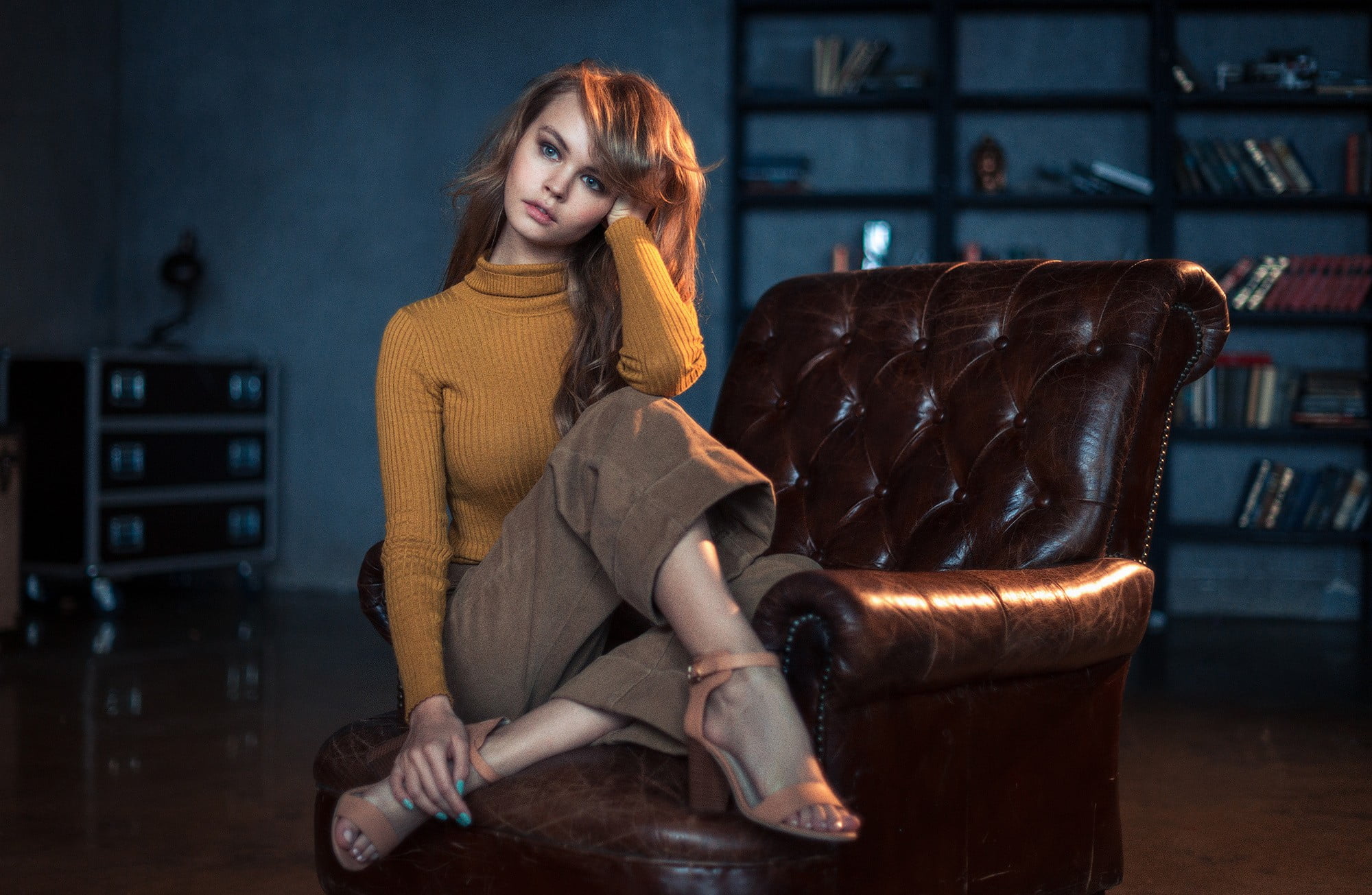 wavy hair, sweater, domestic room, blonde, shoe, long hair, hairstyle, fashion, redhead, young adult, seat, cozy, armchair, sitting, hair, beautiful woman, HD Wallpaper