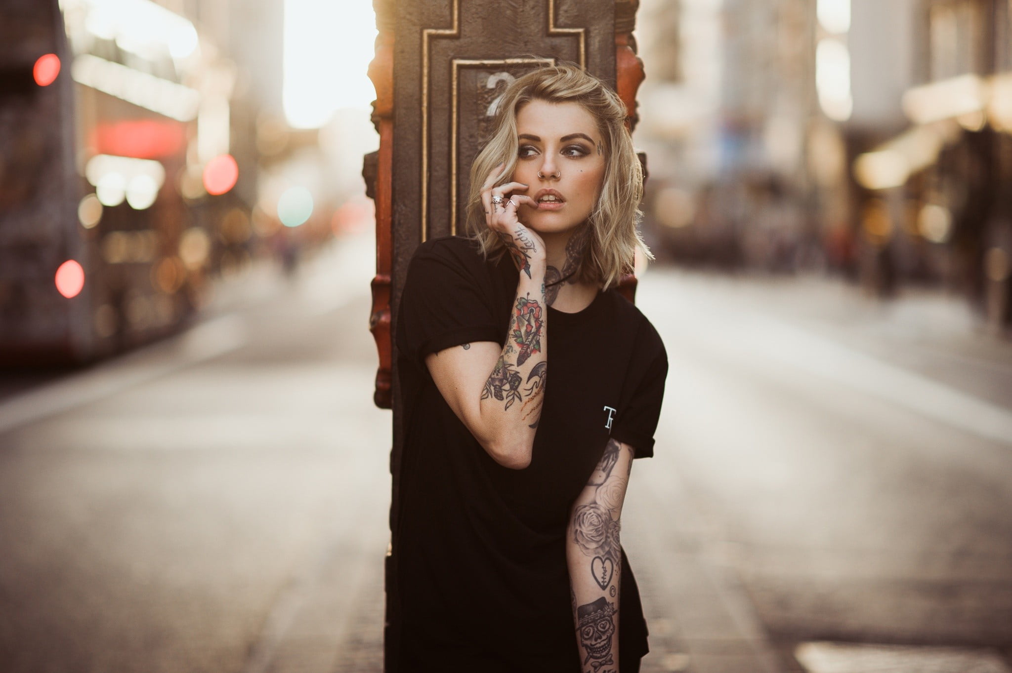 hairstyle, street, young women, beautiful woman, hair, casual clothing, finger on lips, architectural column, architecture, leisure activity, focus on foreground, HD Wallpaper