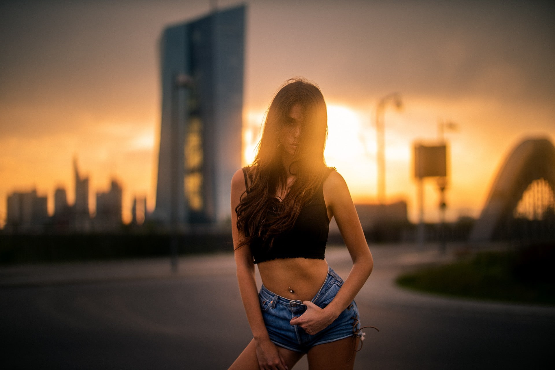 sunset, three quarter length, adult, portrait, young women, brunette, sunlight, architecture, jean shorts, sports clothing, nature, clothing, focus on foreground, HD Wallpaper