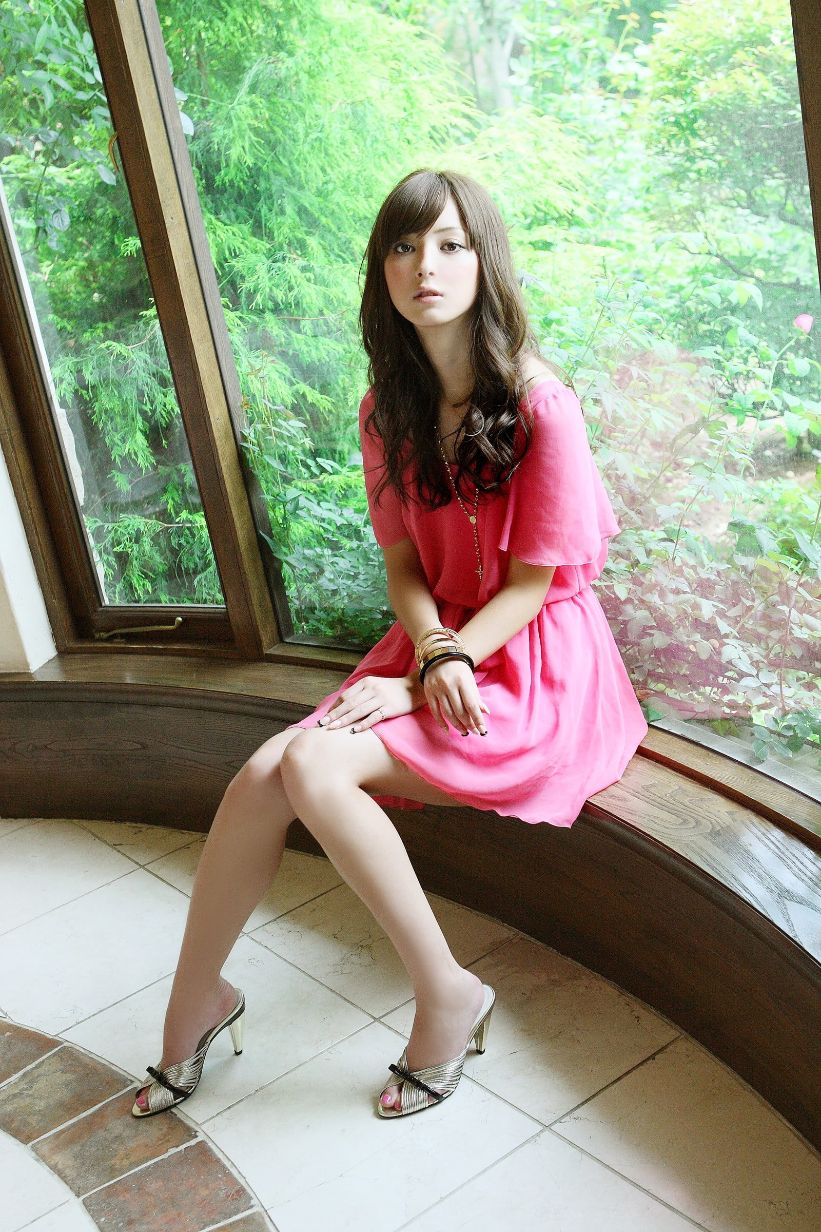 brown hair, window, long hair, dress, women, 1080P, high heels, beautiful woman, clothing, Sasaki Nozomi, full length, hair, sitting, hairstyle, pink color, Phone HD Wallpaper