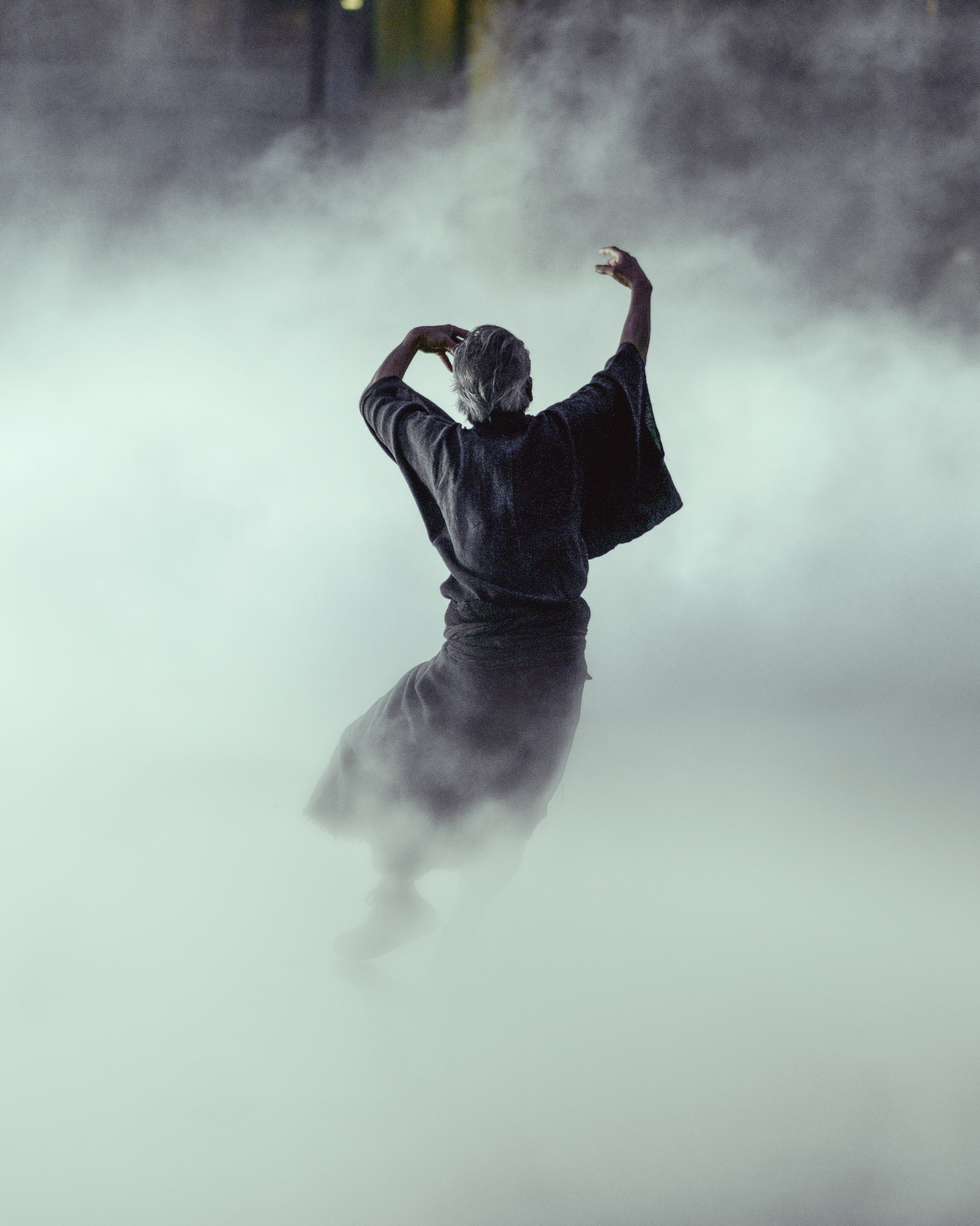 human arm, skill, dress, sky, people, black, adult, one Person, motion, dancing, surrounded, full length, rear view, live, emotion, smoke - physical structure, Phone HD Wallpaper