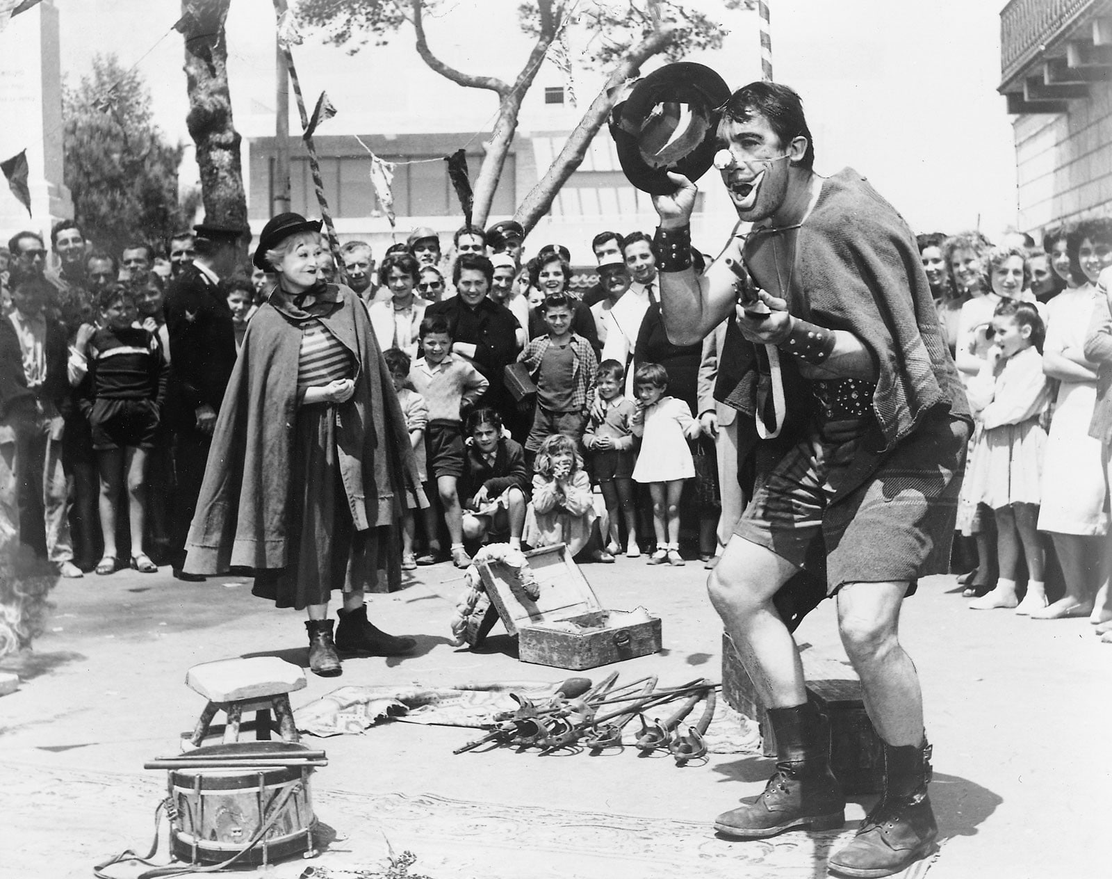 people, city, adult, crowd, building exterior, la strada federico fellini, young men, group of people, architecture, men, young adult, 720P, day, lifestyles, HD Wallpaper