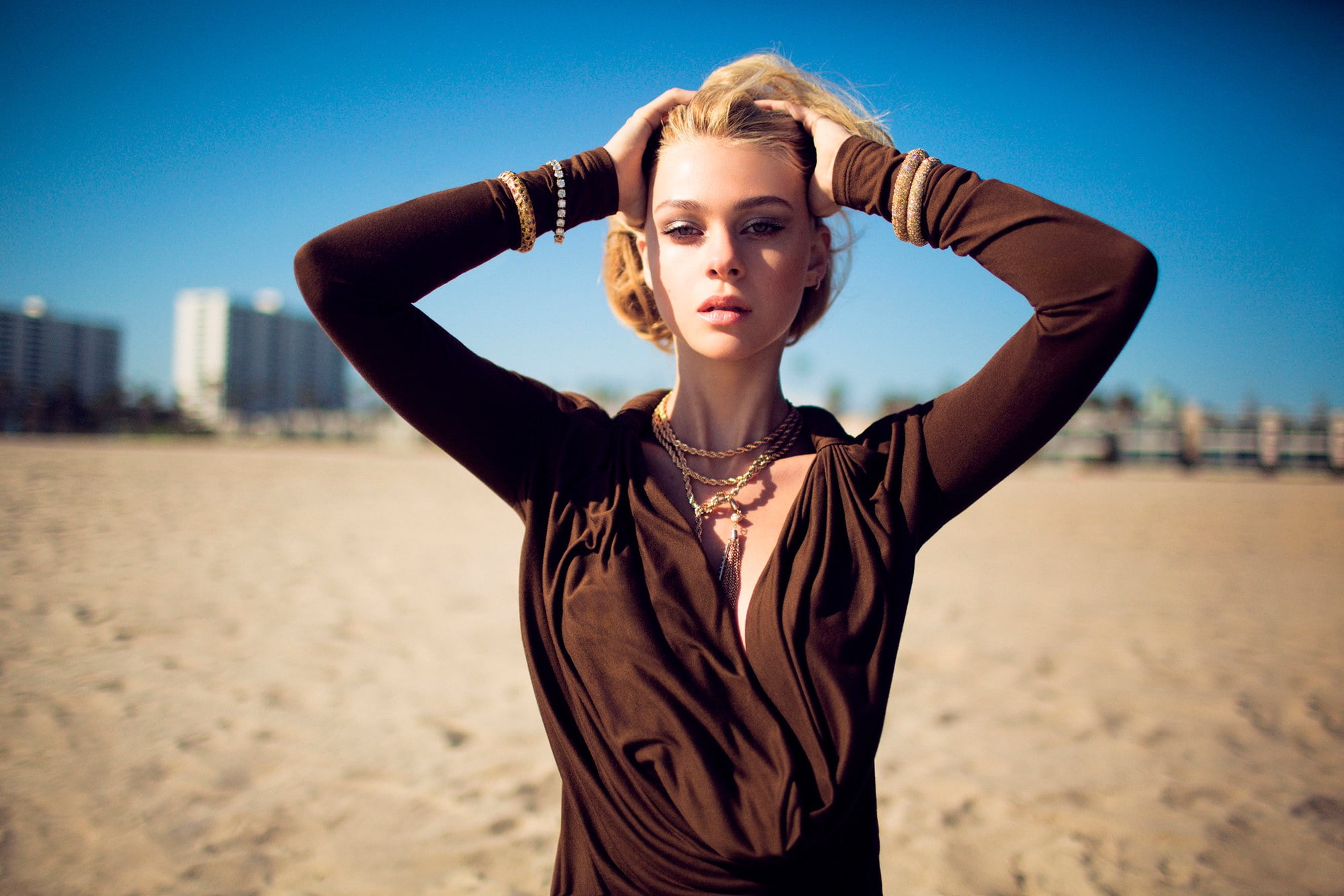beautiful woman, hair, one person, nicola peltz, looking at camera, standing, human arm, outdoors, adult, sky, day, beach, young adult, beauty, portrait, HD Wallpaper