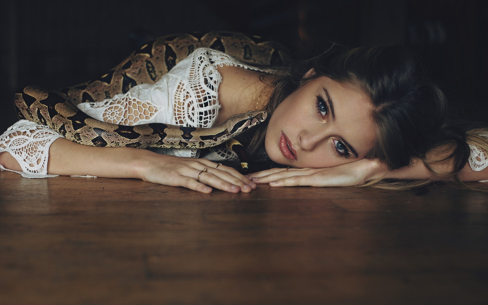 on the floor, women, Camille Rochette, 720P, looking at viewer, lying on front, snake, blue eyes, HD Wallpaper