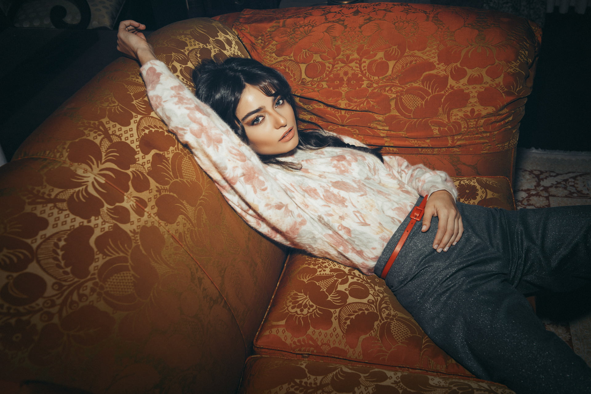 looking at viewer, couch, women, model, 1080P, lying on back, brunette, blue eyes, belt, Turkish, sweater, long hair, women indoors, braids, spread legs, HD Wallpaper