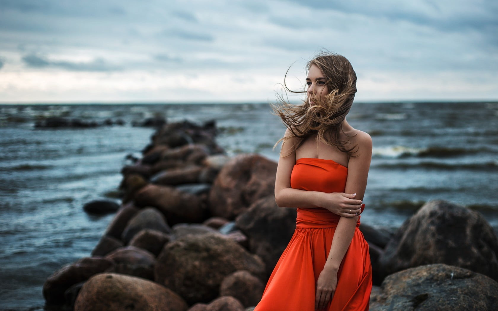 beach, hair, nature, sea, model, wavy hair, 720P, standing, beautiful woman, windy, dress, rock - object, looking away, bare shoulders, one person, outdoors, HD Wallpaper