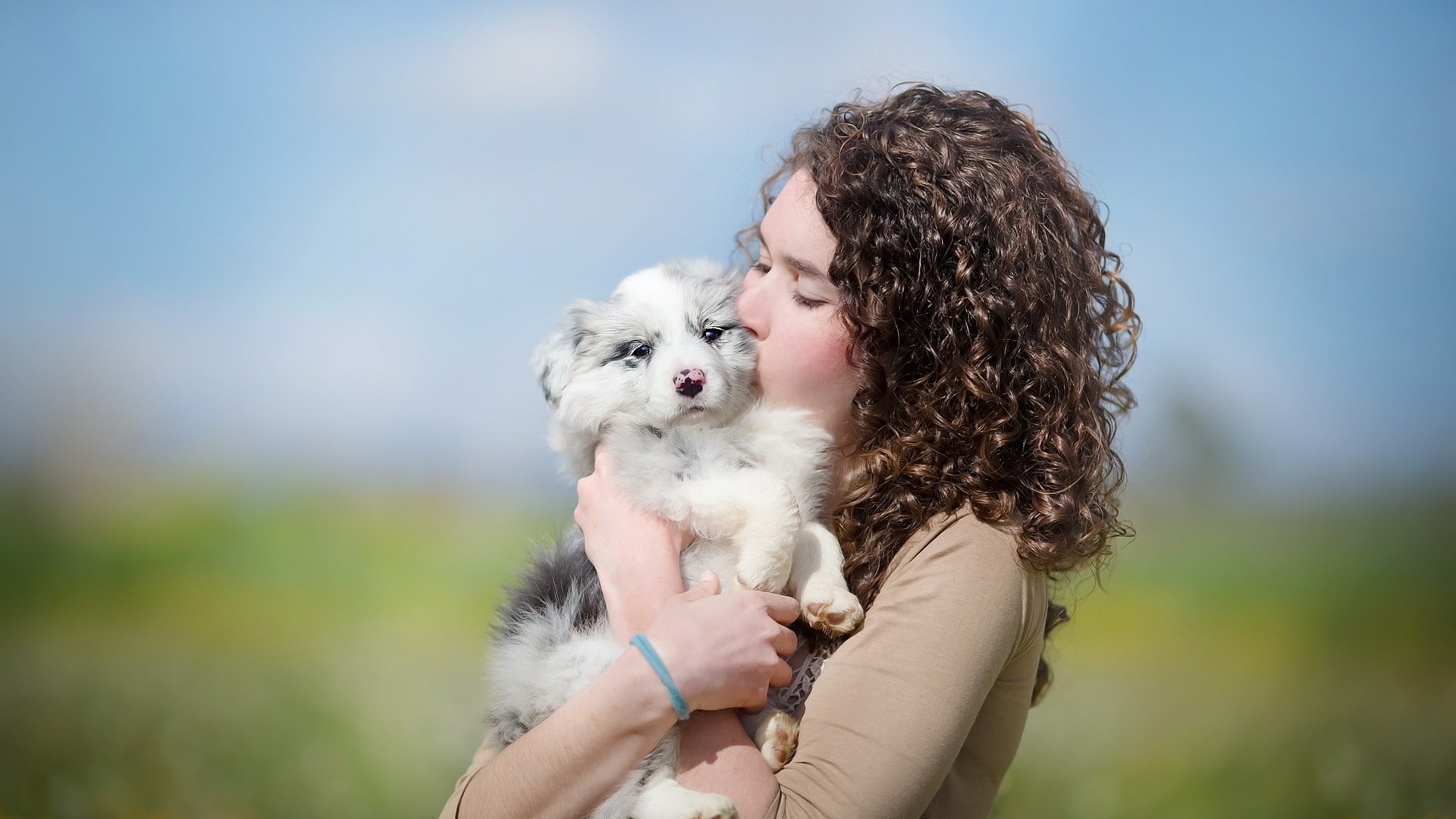 1080P, dog, care, animals, nature, women, bonding, hair, canine, hairstyle, mammal, pet owner, love, curly hair, pets, model, friendship, closed eyes, HD Wallpaper