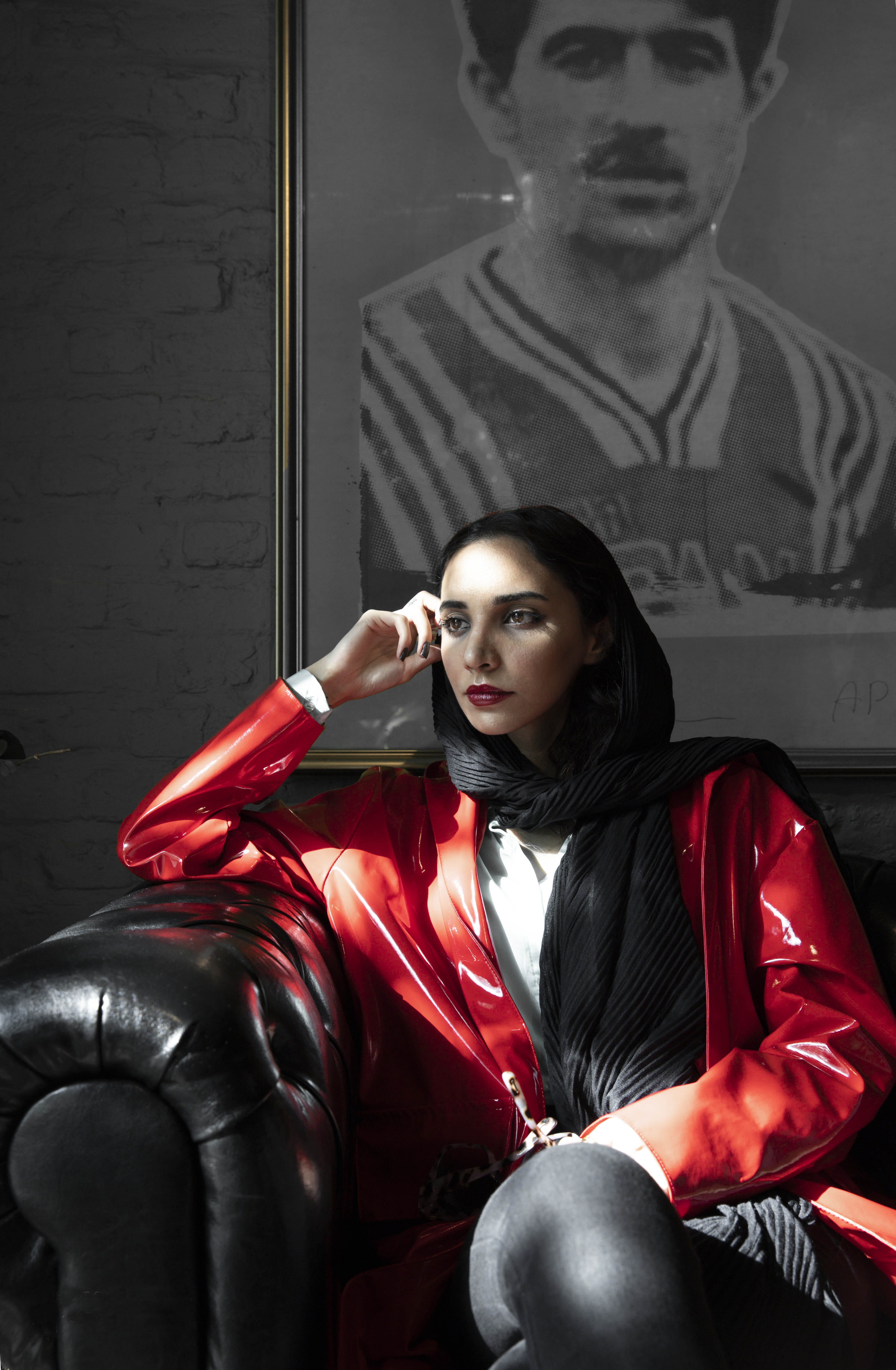 adult, human, sofa, model, latex clothing, face, fashion, indoors, couch, furniture, female, red, spandex, portriat, finger, coat, one person, sitting, Phone HD Wallpaper