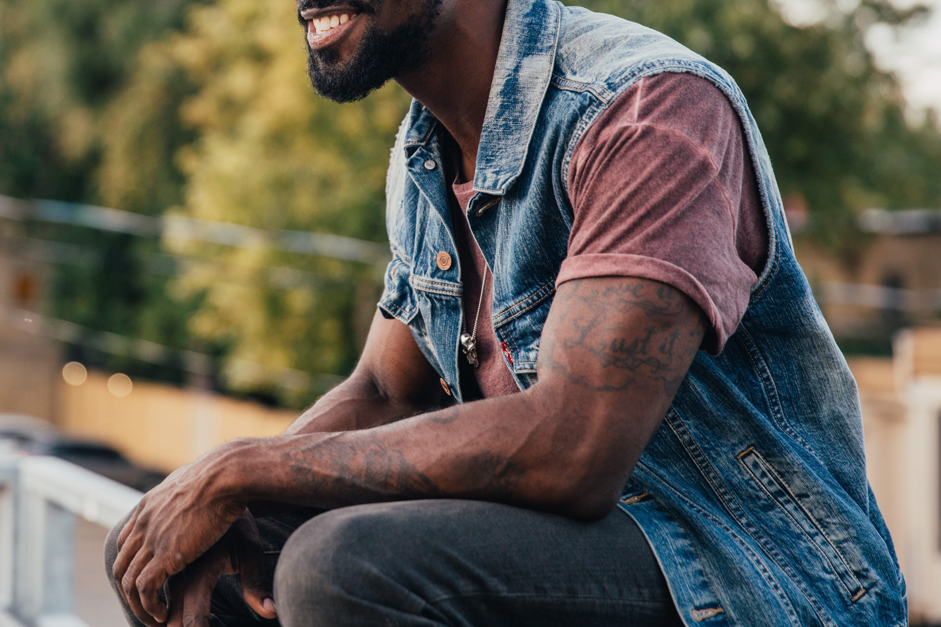 three quarter length, leisure activity, young adult, relaxing, outdoors, tourist, jeans, 25-30 year old, african, arms, park, lifestyles, denim jacket, HD Wallpaper