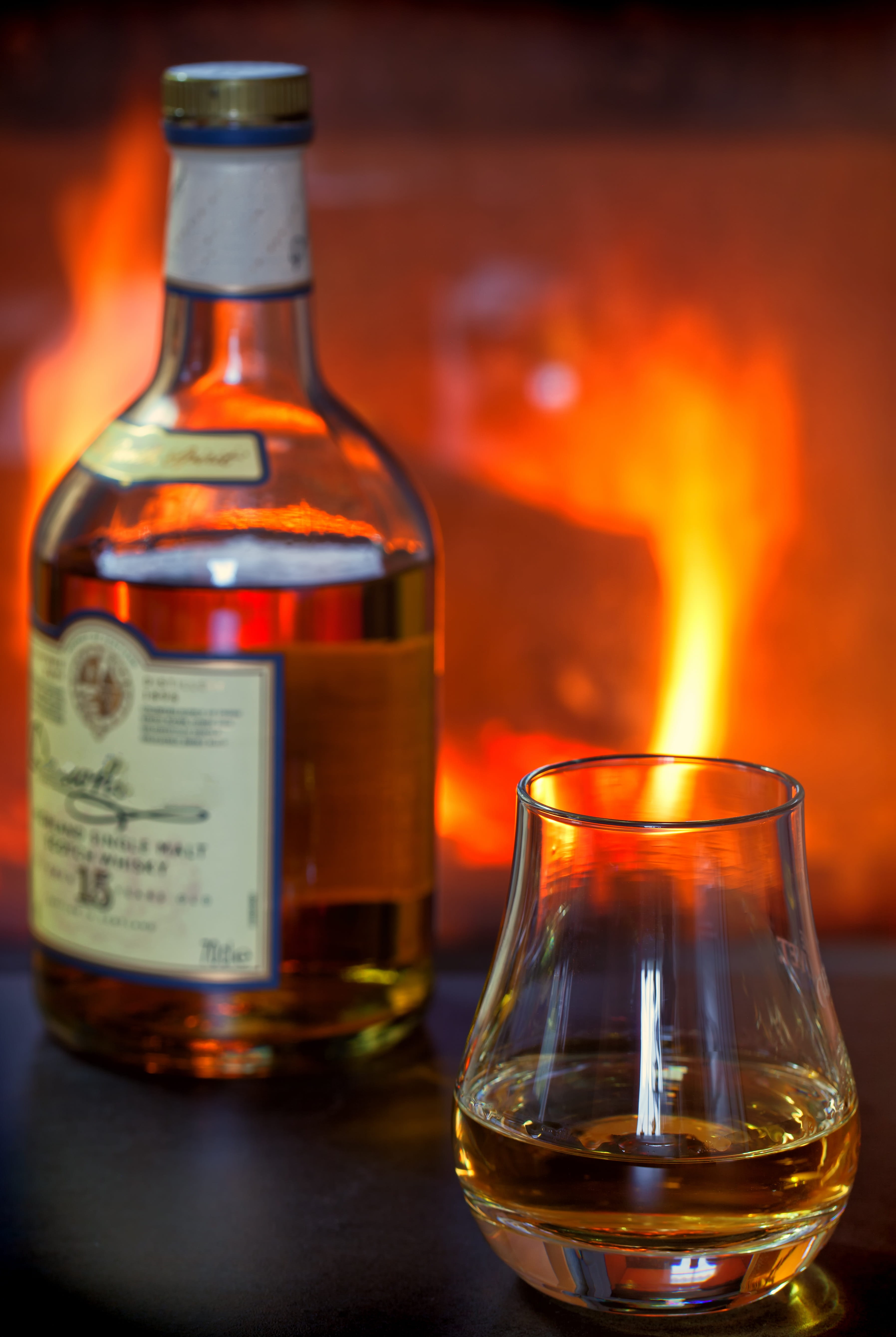 drinking glass, indoors, close-up, burn, wood fire, benefit from, flame, heat, food and drink, bottle, brandy, burning, filled, drink, household equipment, Phone HD Wallpaper