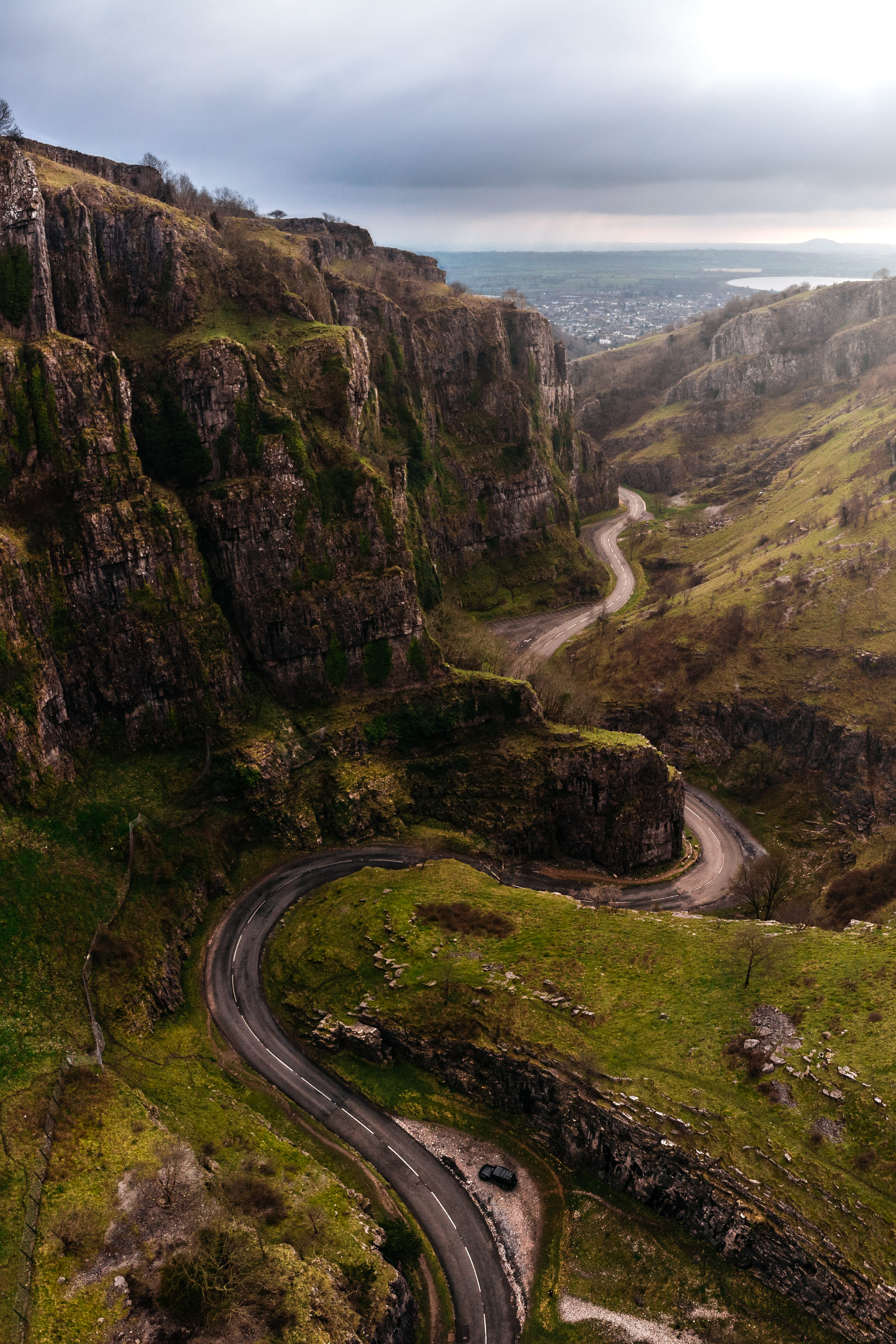 cheddar gorge, cliff, wanderlust, no people, explore, beauty in nature, sky, beside, transportation, landscape, curve, day, horizon, adventure, 4K, high angle view, Phone HD Wallpaper