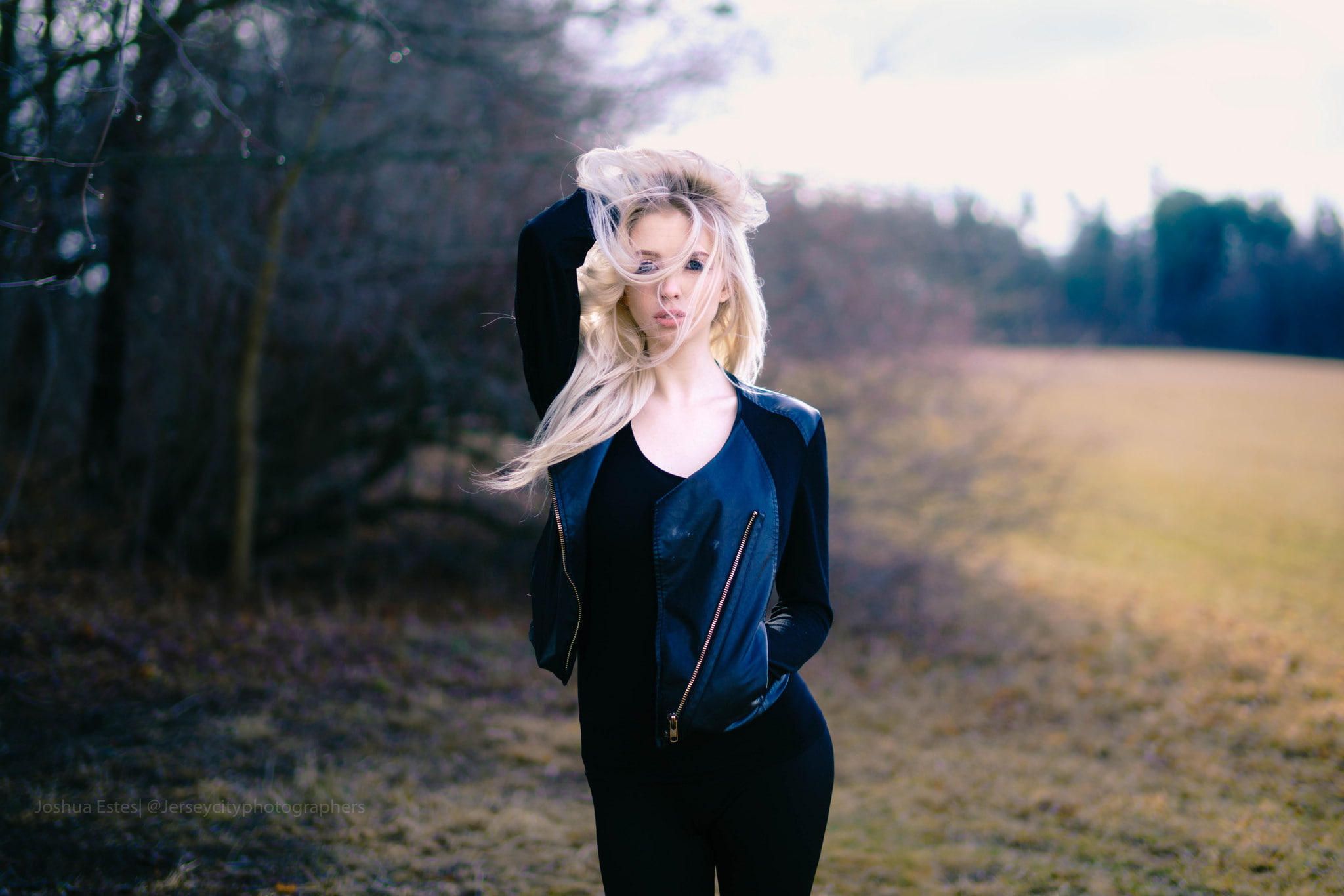 women outdoors, 1080P, hands in pockets, blonde, blue eyes, hair in face, leather jackets, hands in hair, HD Wallpaper