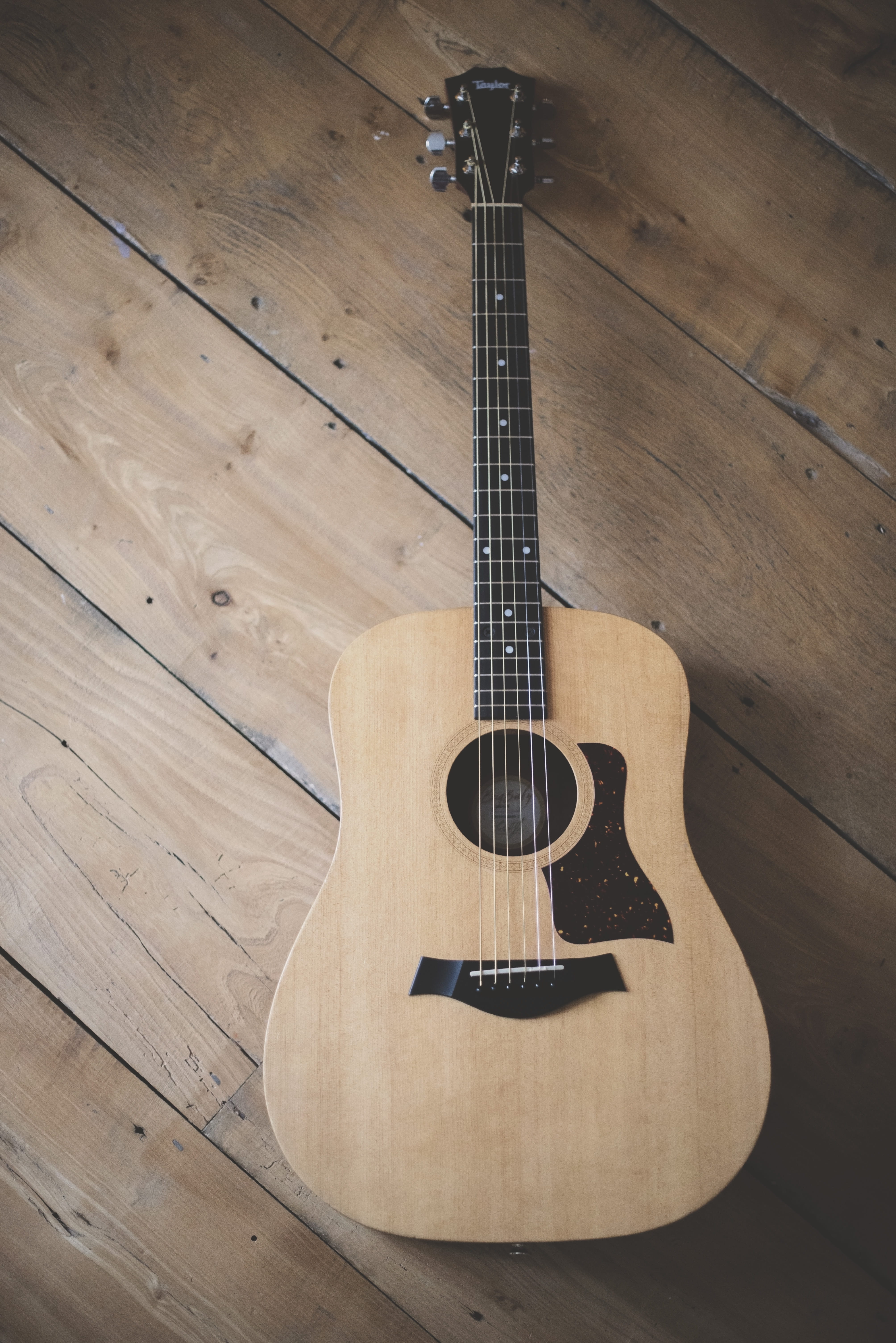 taylor, beauty, flooring, single object, string instrument, musical equipment, table, string, wood, simple, 5K, arts culture and entertainment, wood - material, Phone HD Wallpaper