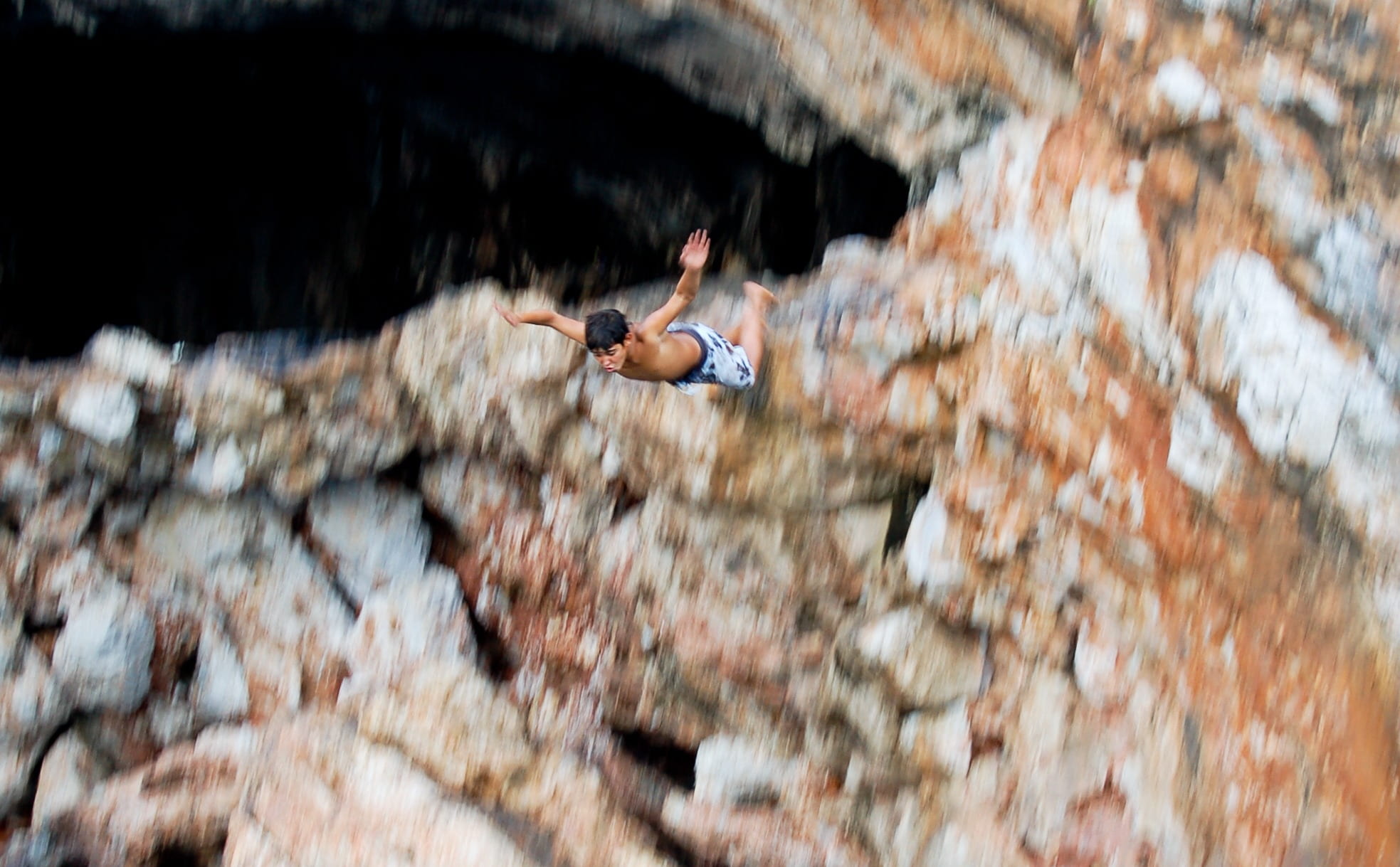 arms raised, side view, outdoors, 1080P, jumping, excitement, selective focus, human arm, plunge, rocks, just, young adult, animal wildlife, go to, cliff, HD Wallpaper