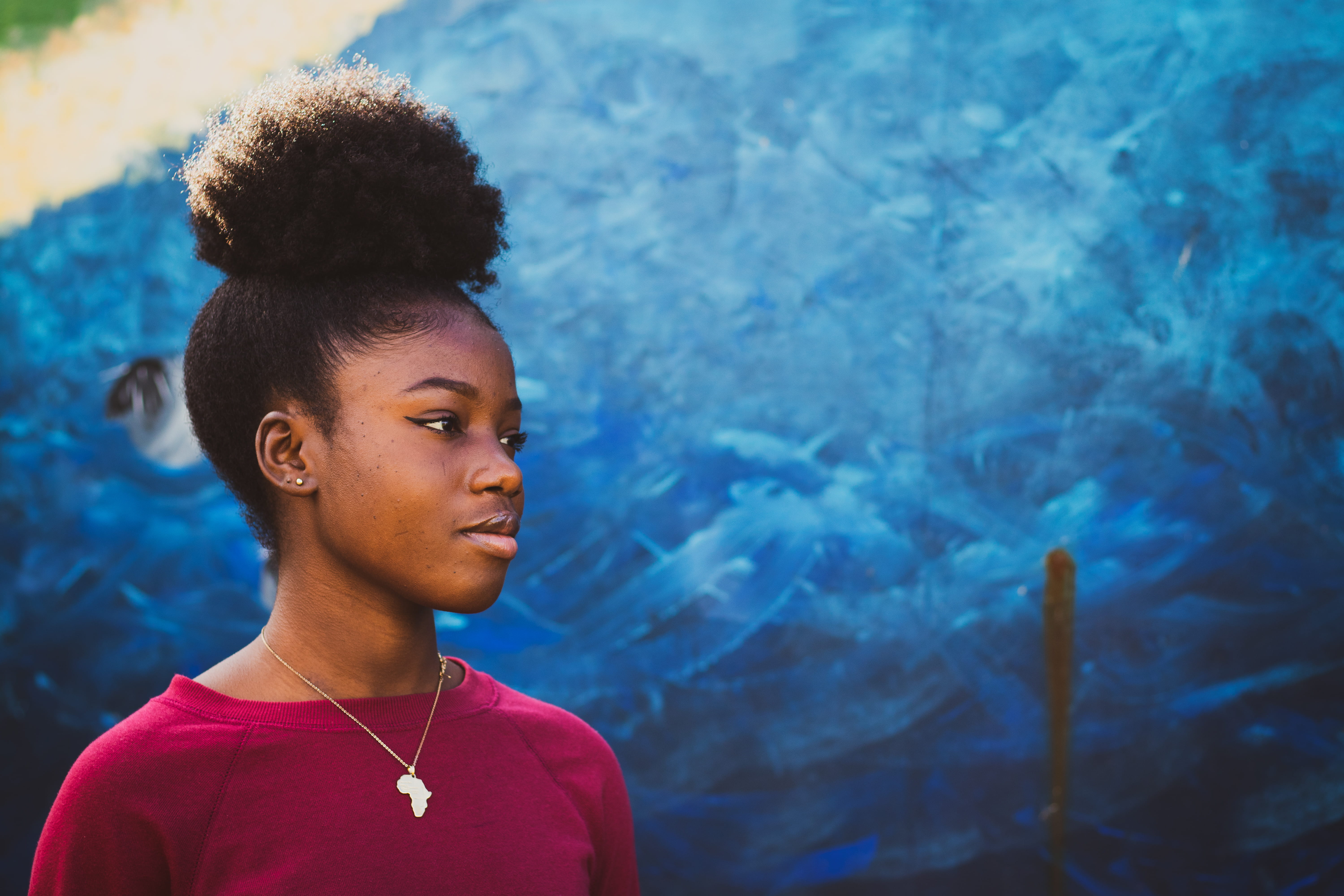 female, black Color, concrete, black, smiling, only Women, 5K, casual Clothing, lifestyles, african Descent, arts Culture and Entertainment, mural background, HD Wallpaper