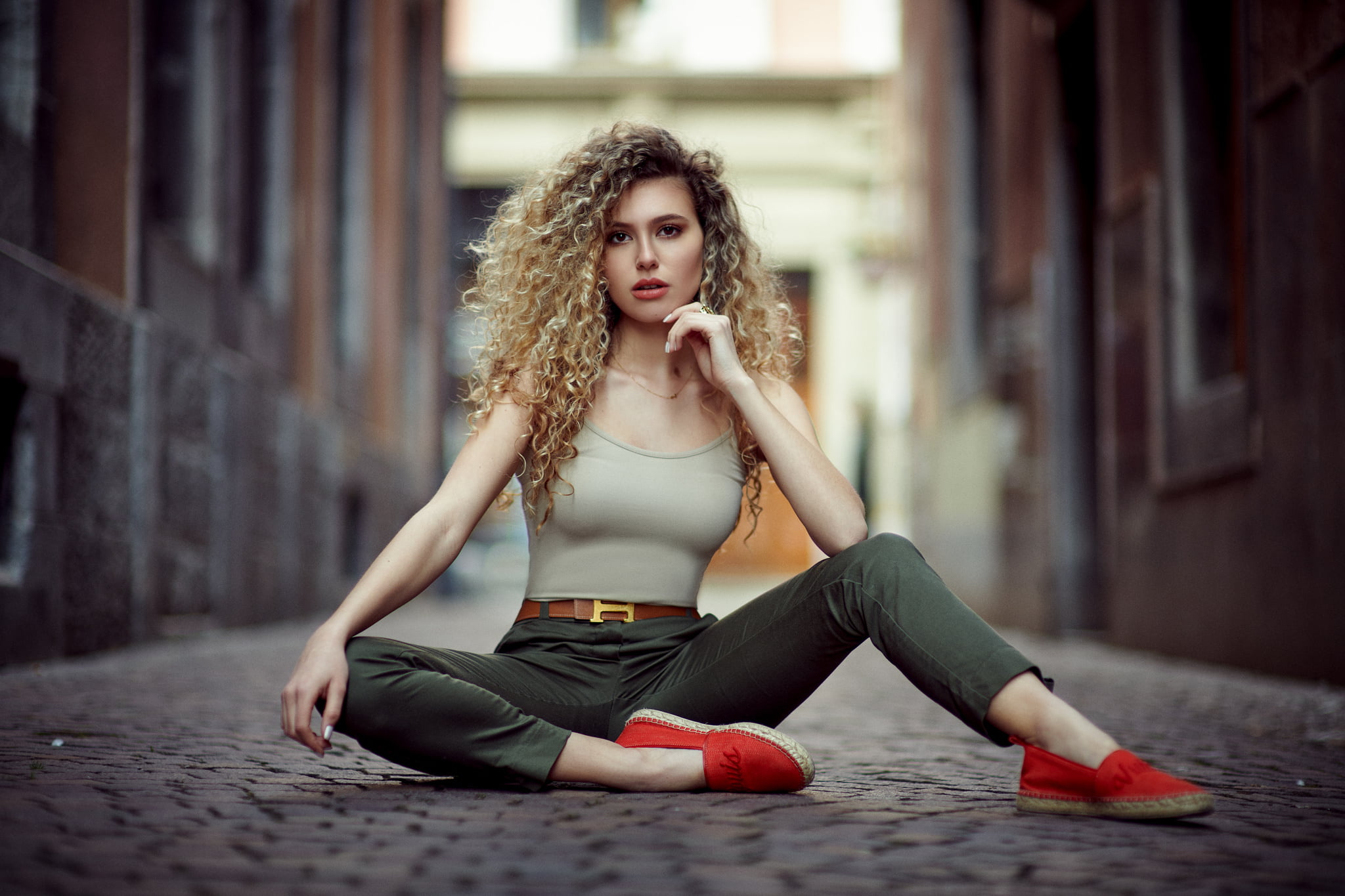 long hair, portrait, city, tank top, necklace, young women, fashion, on the floor, curly hair, hair, beautiful woman, front view, women outdoors, outdoors, HD Wallpaper