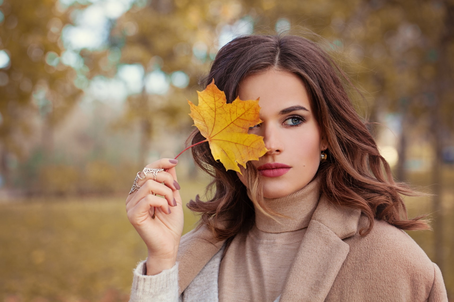 face, beautiful woman, women outdoors, portrait, maple leaf, leaf, brown hair, makeup, women, autumn, beauty, looking at camera, human face, coats, painted nails, HD Wallpaper