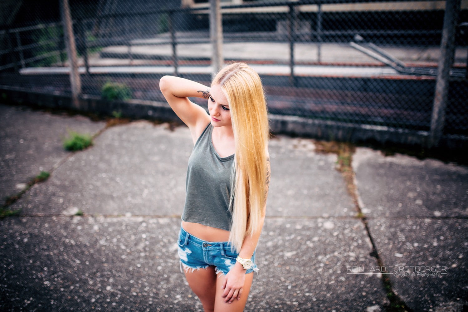 long hair, blonde, Reinhard Fürstberger, looking away, portrait, women, tattoo, T-shirt, hands on head, jean shorts, 720P, HD Wallpaper