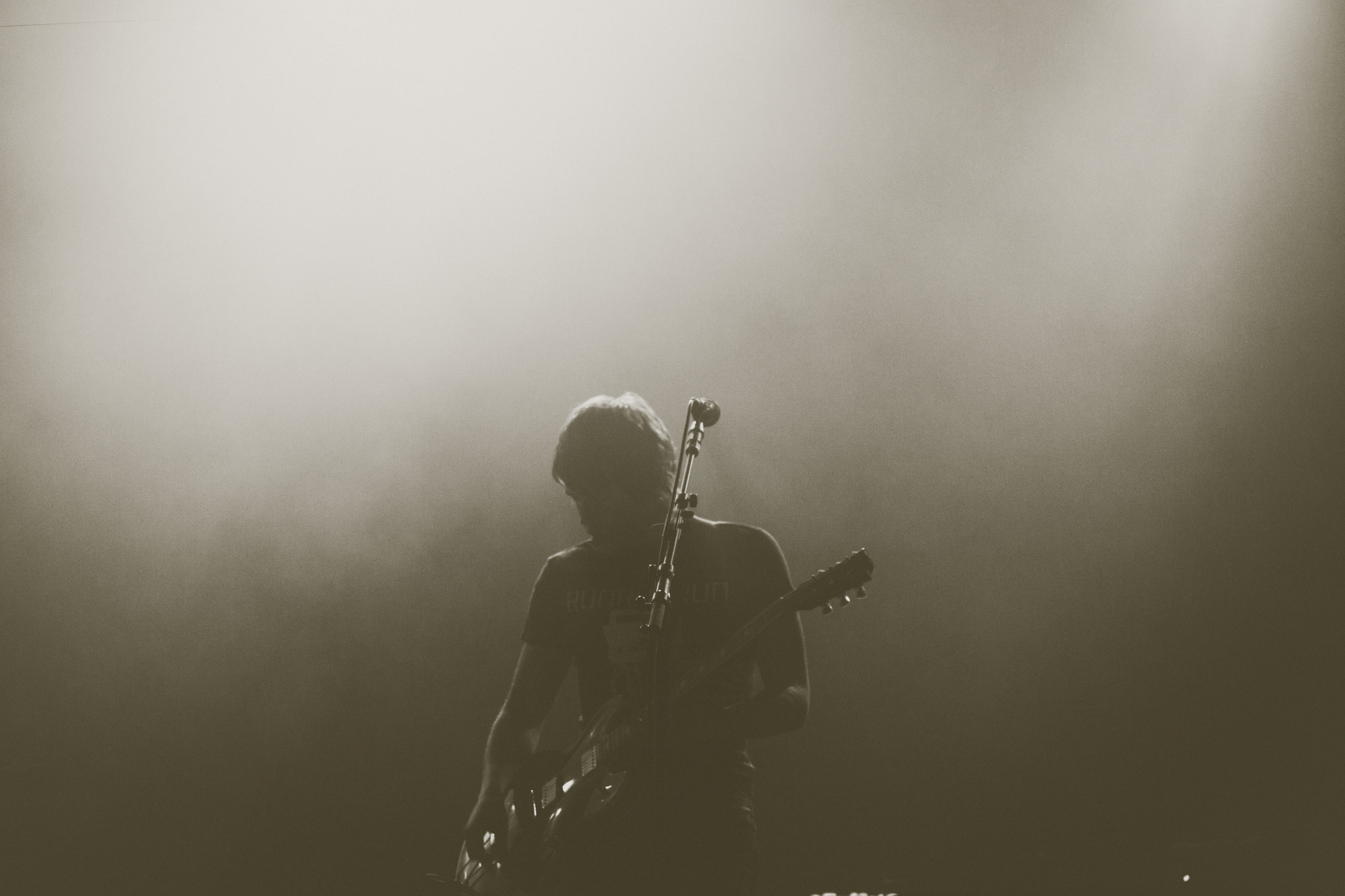 light, men, playing, 4K, singer, lights, live, standing, music, concert, photography, sepia, piece of music, spotlight, waist up, england, show, one person, HD Wallpaper