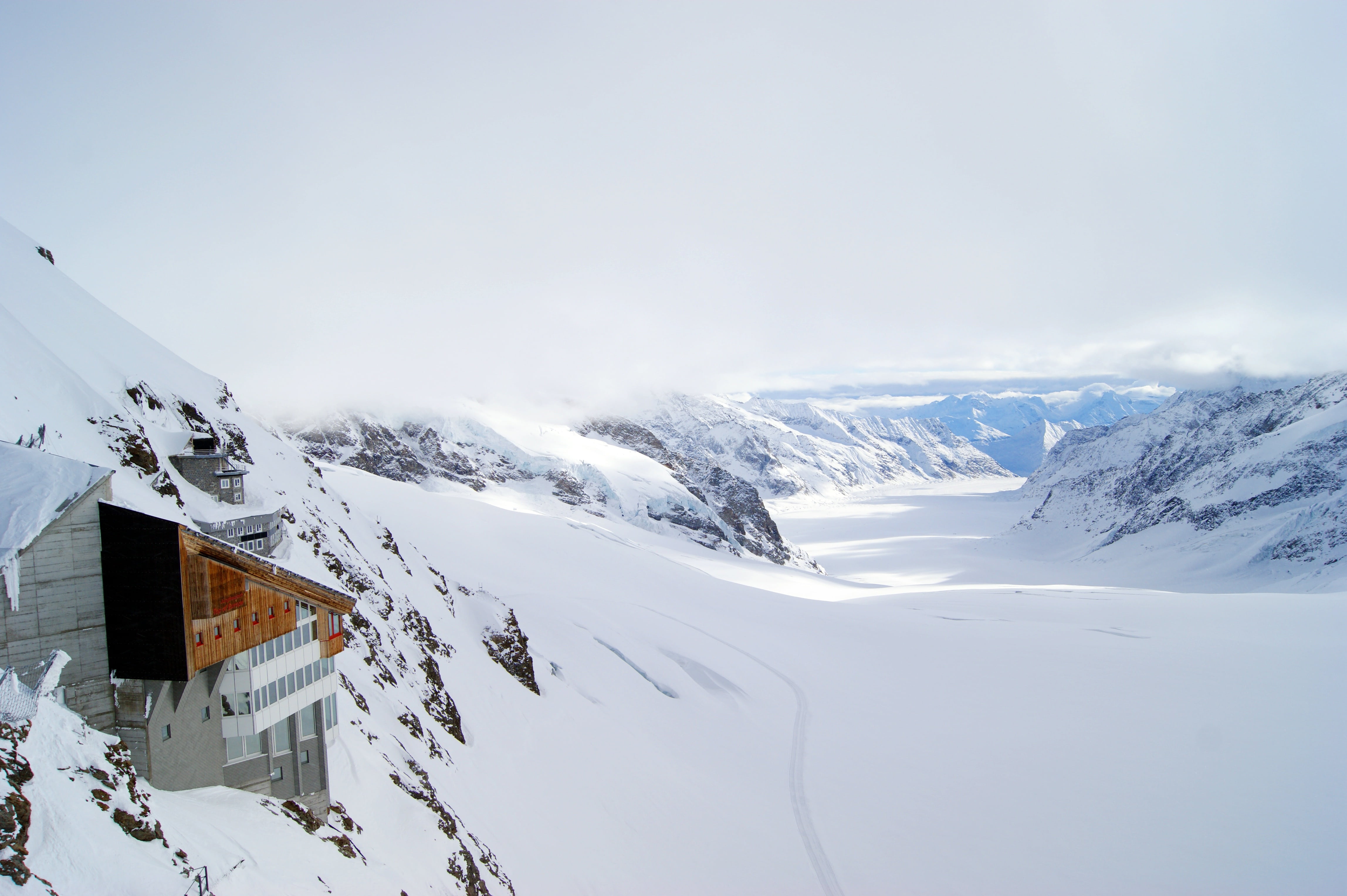 snow, snowy, ski resort, landscape, sky, extreme weather, snow landscape, built structure, 4K, beauty in nature, snowing, mountain, alpine, mountains, HD Wallpaper