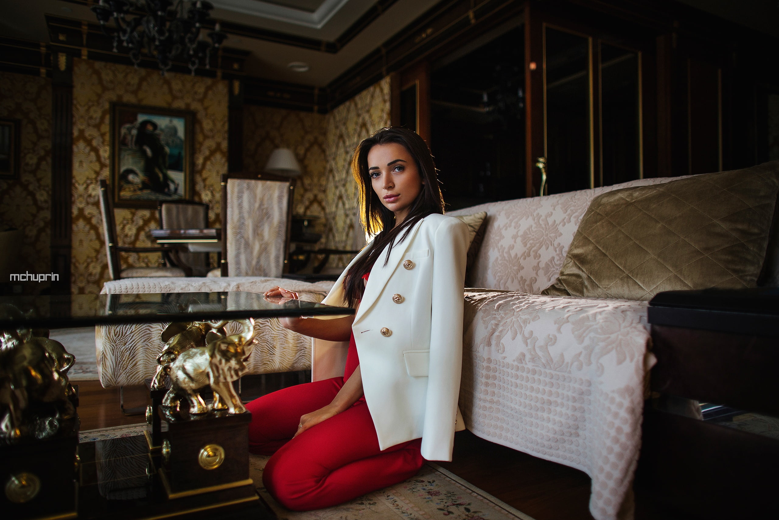 long hair, looking at viewer, couch, Maksim Chuprin, depth of field, coats, on the floor, indoors, 2K, kneeling, women, model, women indoors, pants, HD Wallpaper