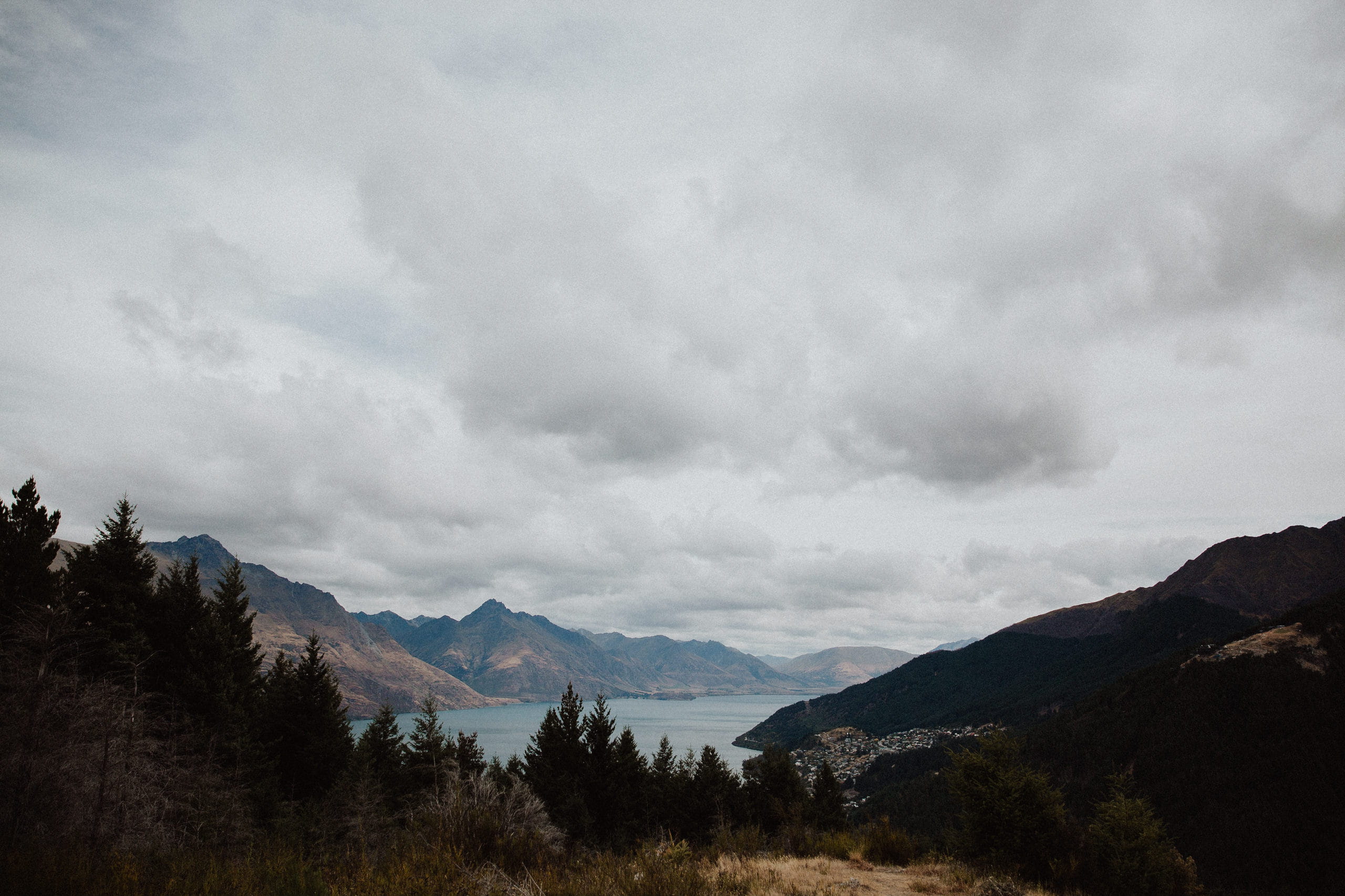 no people, lake, non-urban scene, coniferous tree, scenics - nature, pine tree, queesntown, water, storm cloud, moutain, tranquil scene, cloud - sky, storm, HD Wallpaper