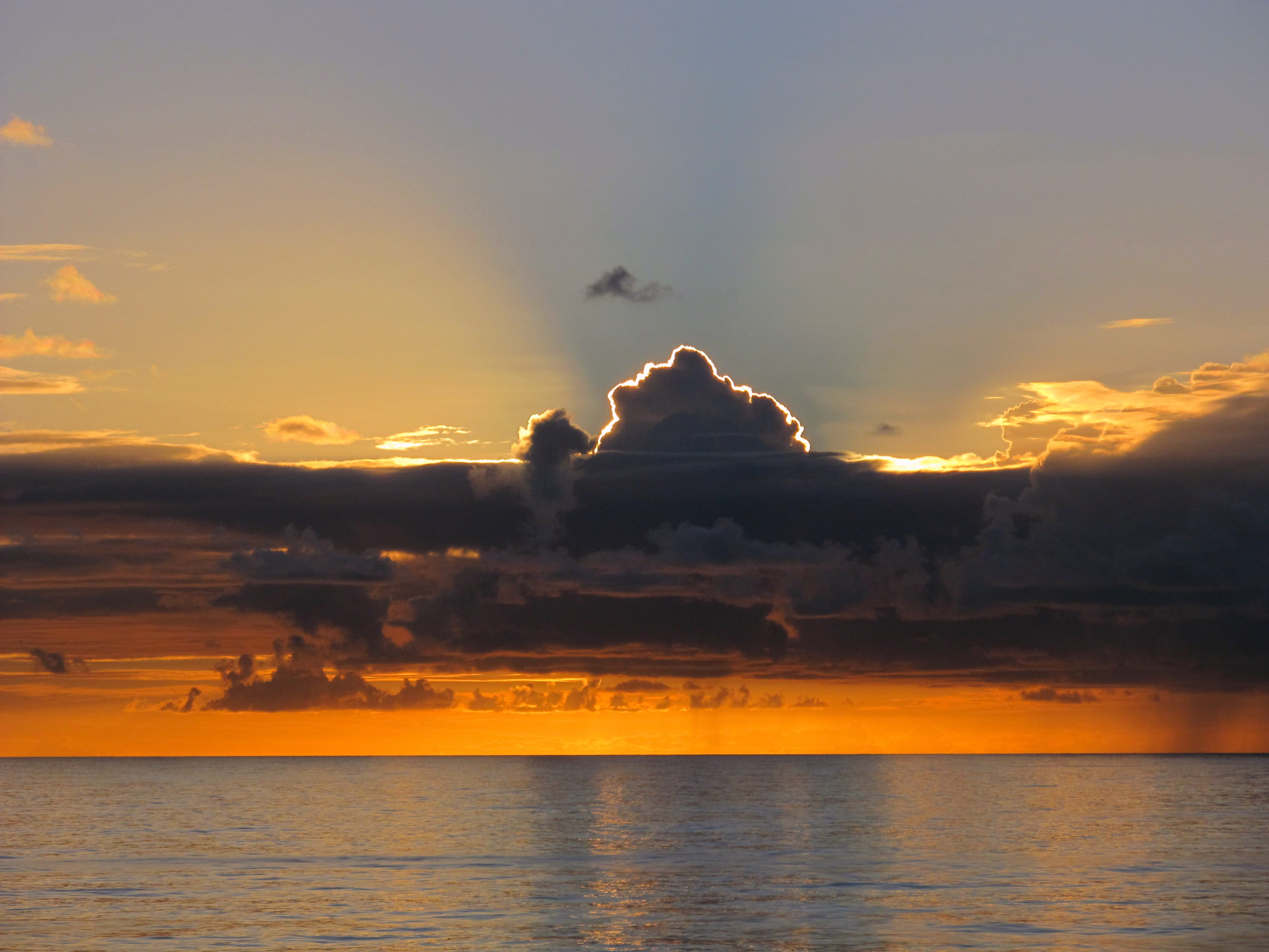 photo, tranquility, reflection, silhouette, ocean, outdoors, no people, golden, clouds, orange color, photograph, dramatic sky, 4K, nature, sun, tranquil scene, HD Wallpaper