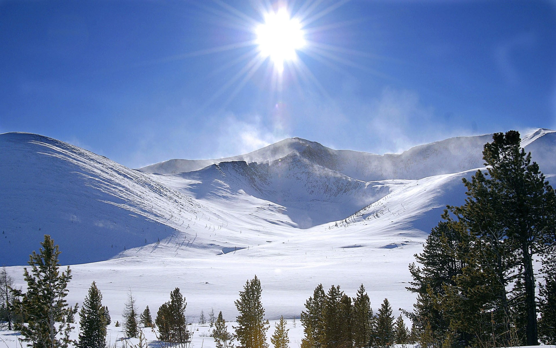 sky, blue, snow, sunbeam, sun rays, 1080P, windy, day, mountain range, landscape, plant, mountain peak, pine tree, nature, cold temperature, environment, HD Wallpaper