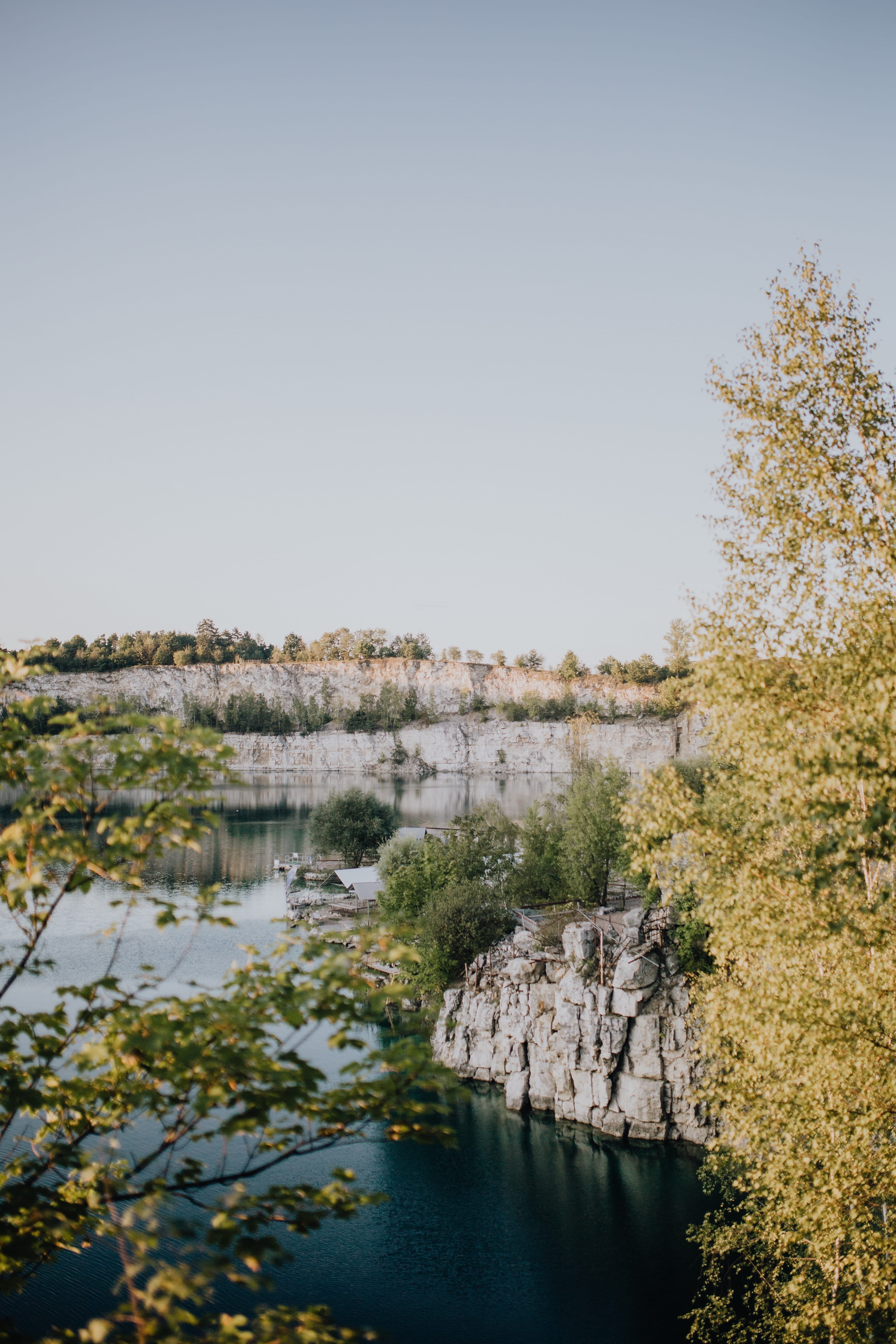 flooded, rocks, reservoir, clear sky, Europe, non-urban scene, quarry, Poland, zakrz, nature, krakow, cliff, plant, 5K, reflection, day, no people, tranquil scene, Phone HD Wallpaper