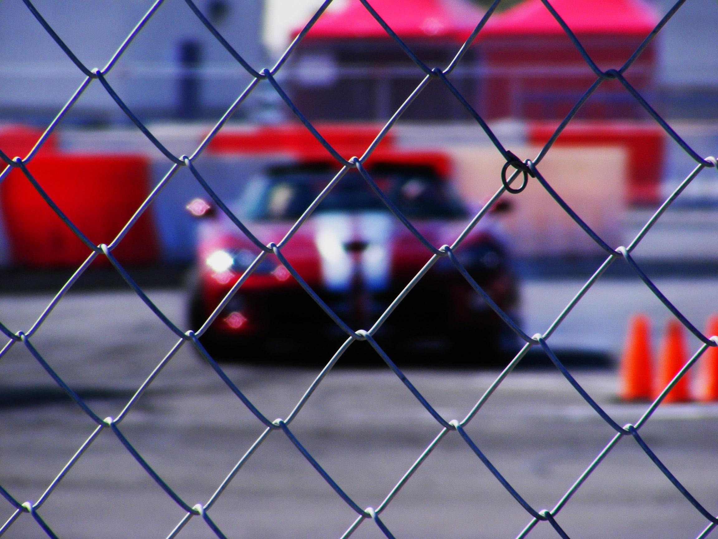 no people, depth of field, architecture, transportation, day, focus on foreground, built structure, city, outdoors, Dodge Viper, barrier, red, 1080P, building exterior, HD Wallpaper