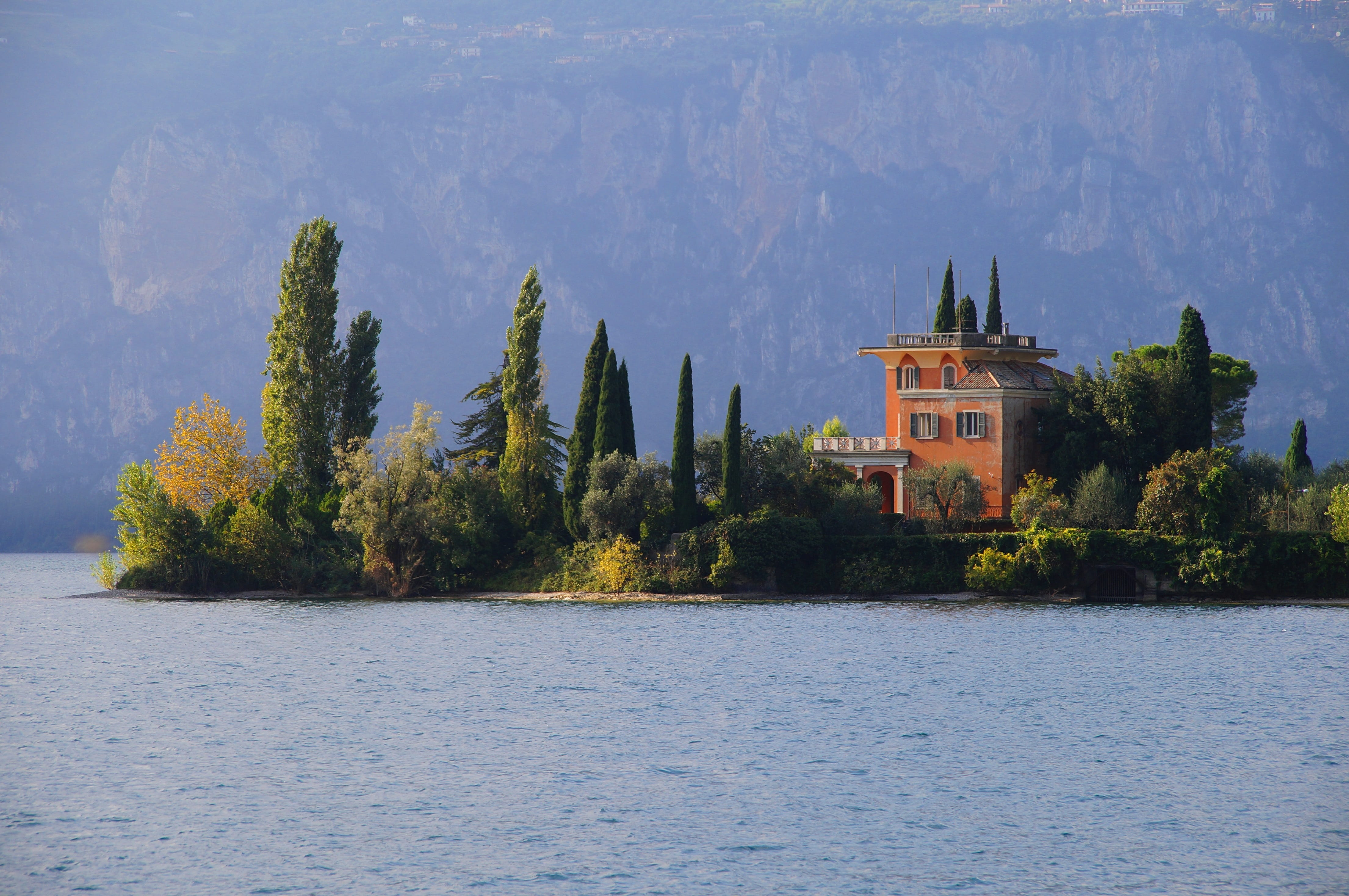 lake, house, holiday, building exterior, 4K, tranquil scene, Island, water, mountain, architecture, growth, tree, no people, garda, Italy, plant, tranquility, HD Wallpaper
