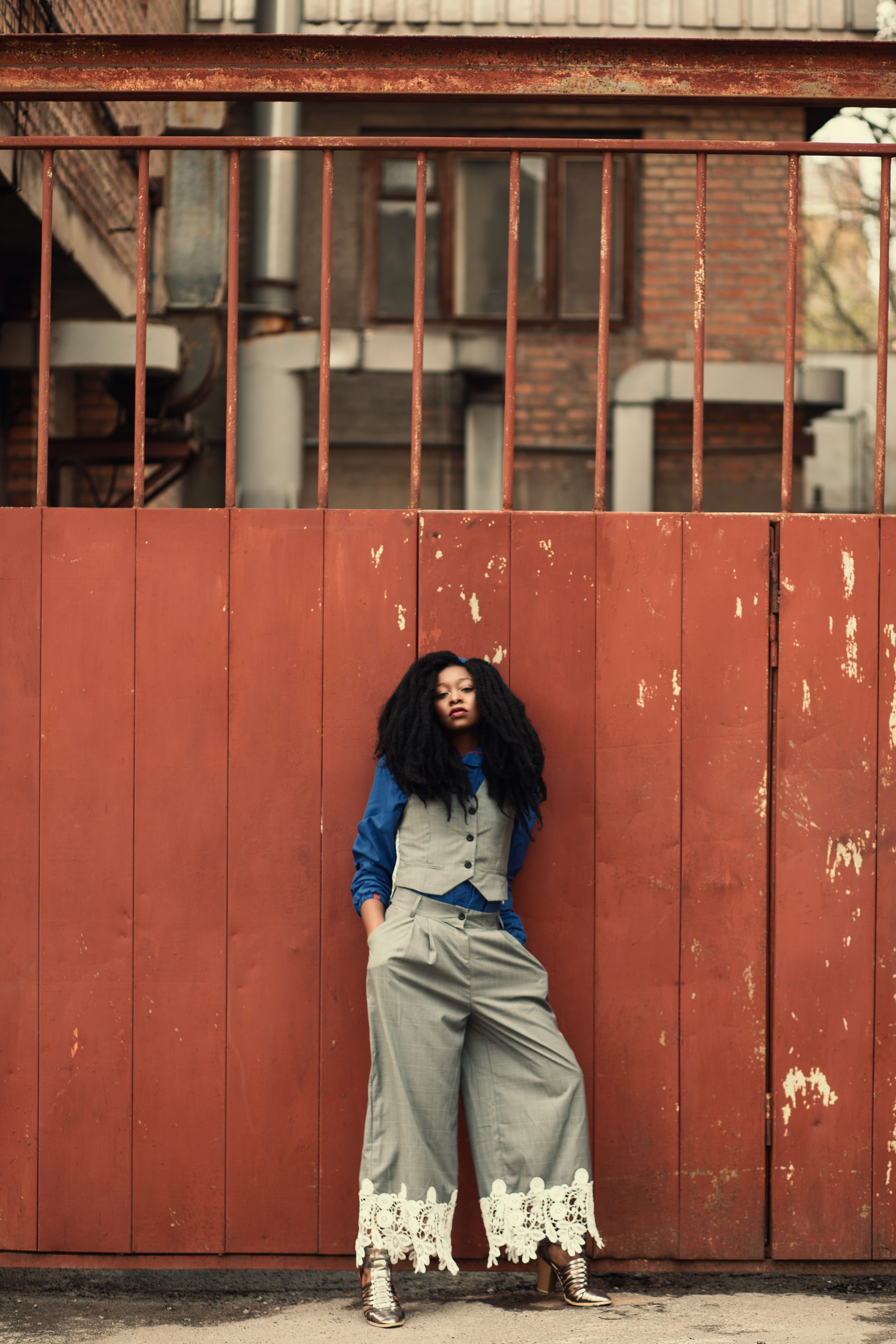 woman, depression - sadness, fashionable, young women, rust, built structure, outdoors, wearing, fashion model, wall, sitting, young girl, city, standing, Phone HD Wallpaper