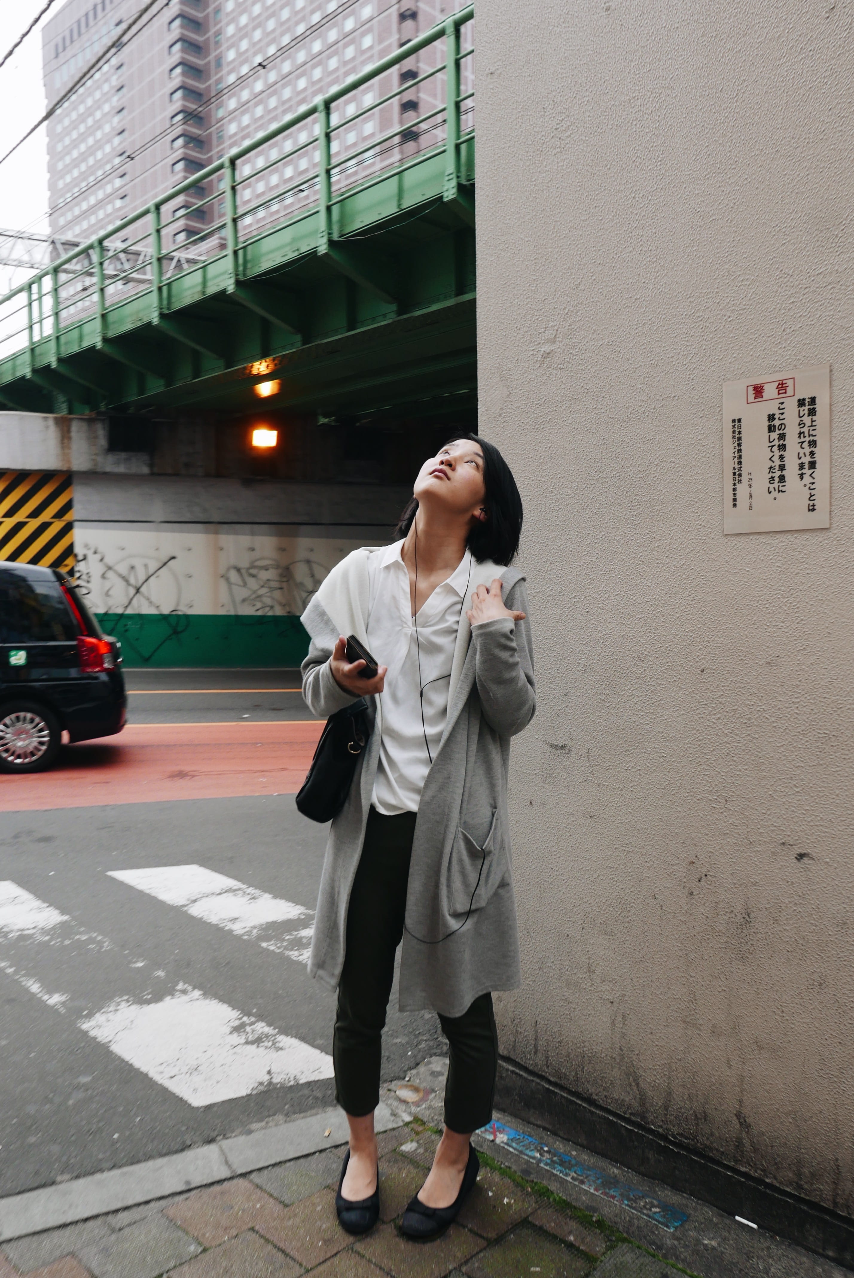 young adult, casual clothing, japan, technology, white, leisure activities, day, wearing, fashion, floor, looking, standing, real people, walking, woman, Phone HD Wallpaper