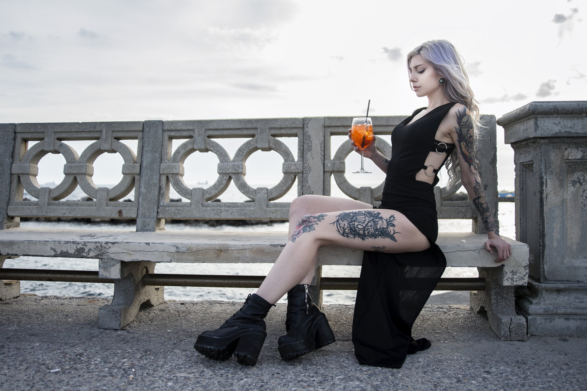 young adult, full length, fashion, young women, nature, hairstyle, front view, sky, 1080P, real people, seat, casual clothing, tattoo, sitting, one person, HD Wallpaper