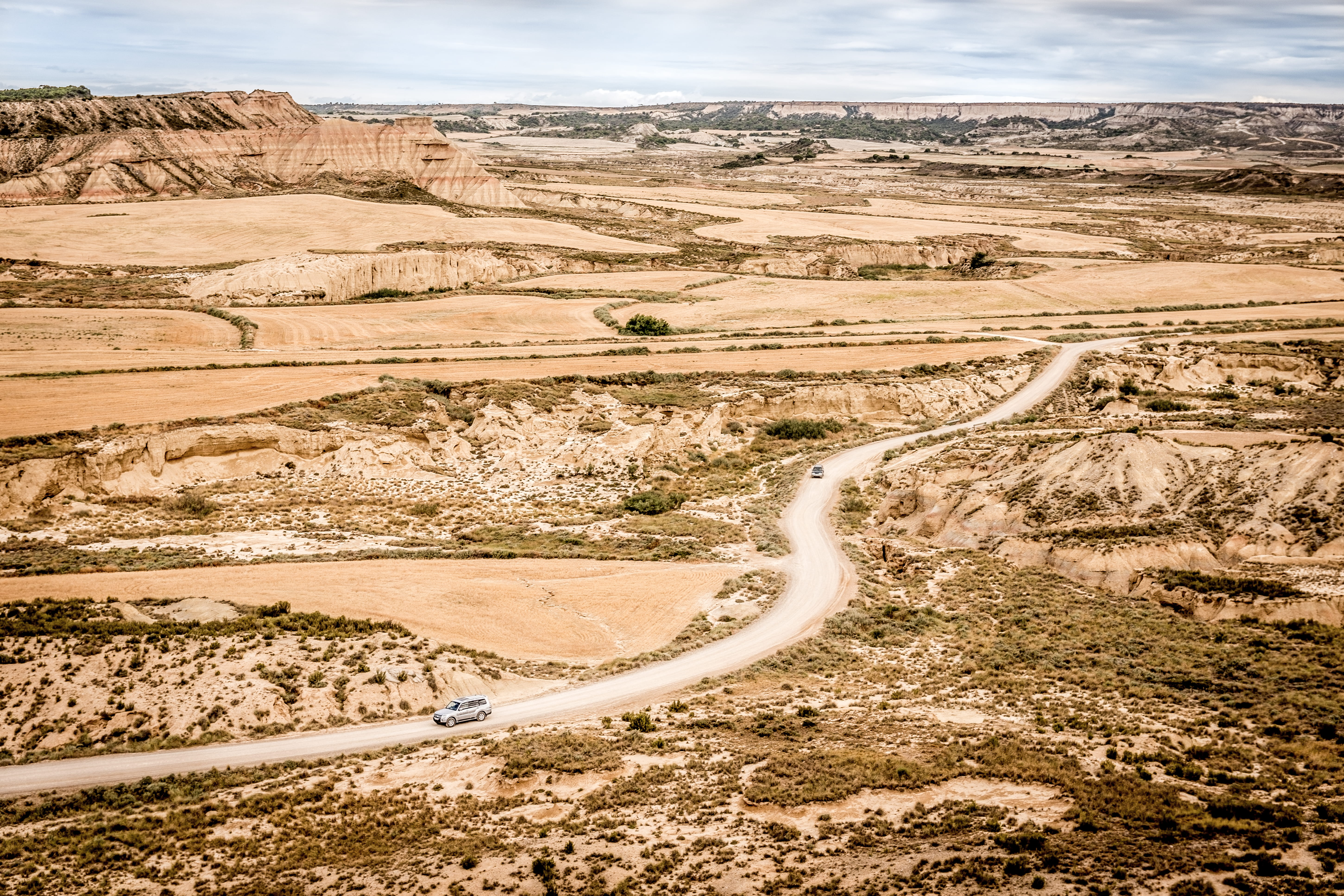 scenics - nature, travel destinations, mountain, remote, winding road, ground, national, transportation, physical geography, bardenas reales, soil, outdoors, HD Wallpaper