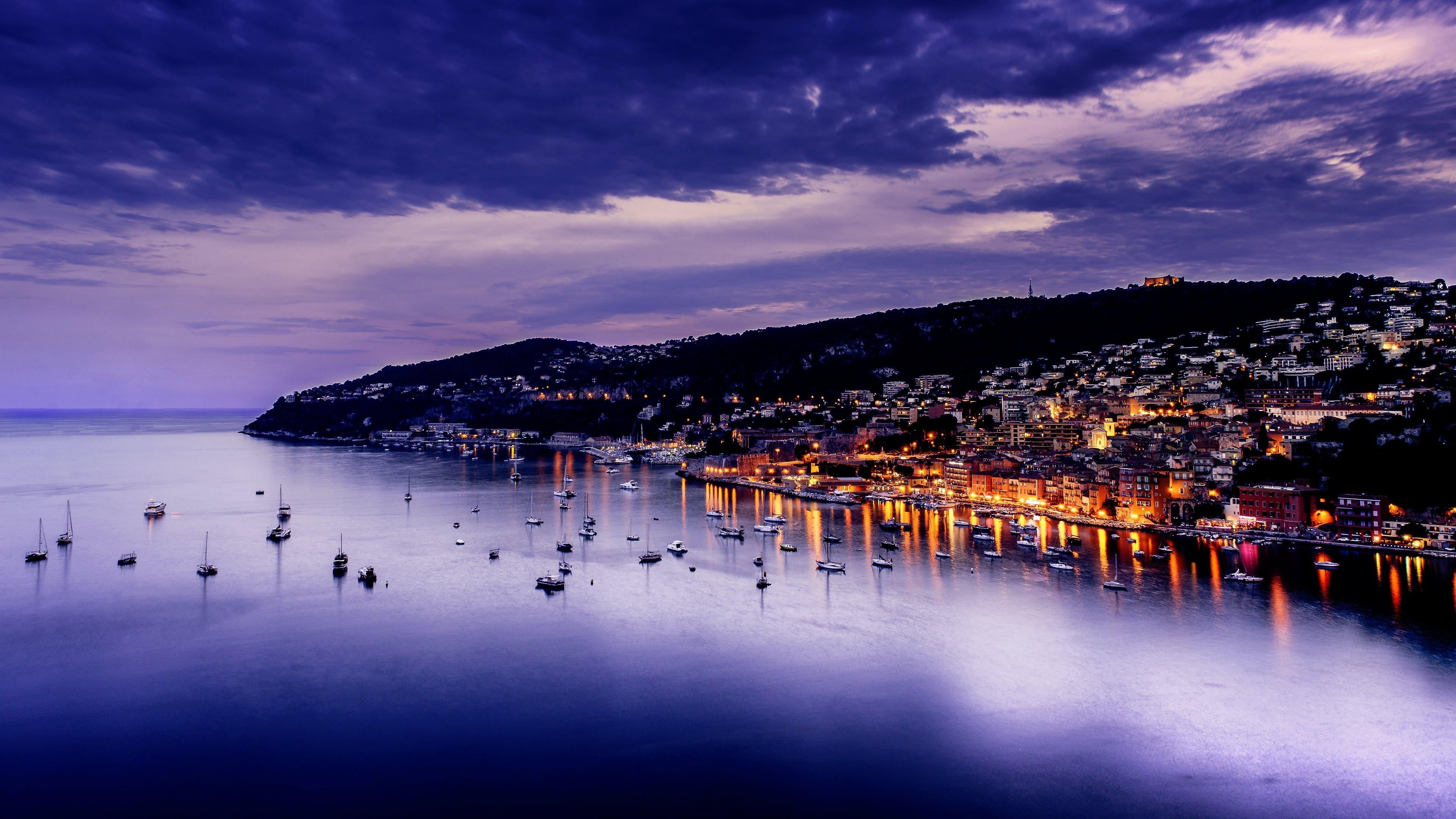 calm, body of water, architecture, building exterior, sunset, travel destinations, french riviera, water, 4K, winter, europe, night, crowd, evening, cityscape, HD Wallpaper