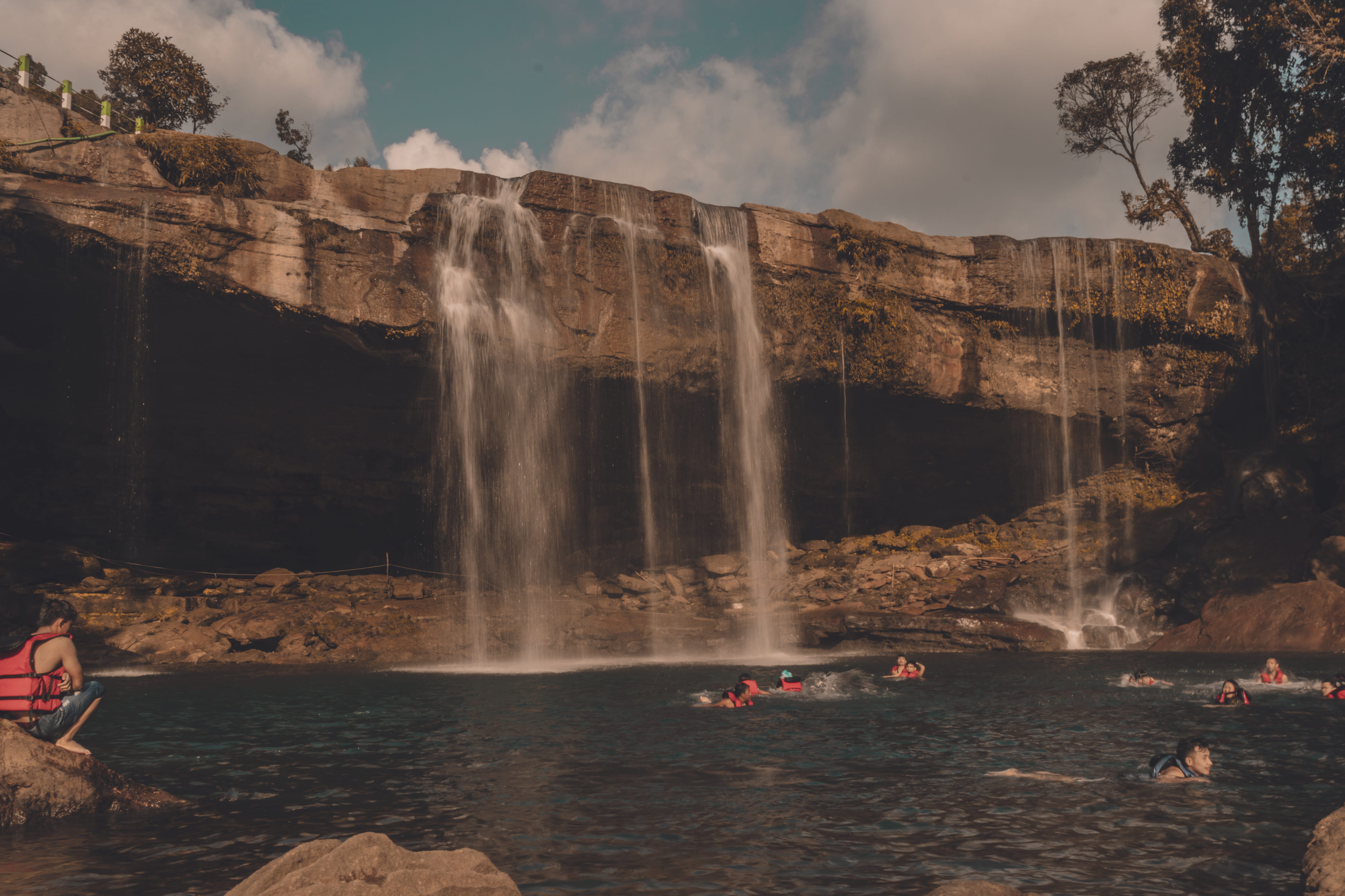 outdoors, water, sky, rock - object, leisure activity, group of people, women, sea, waterfalls, beauty in nature, lifestyles, landscape, flowing water, HD Wallpaper