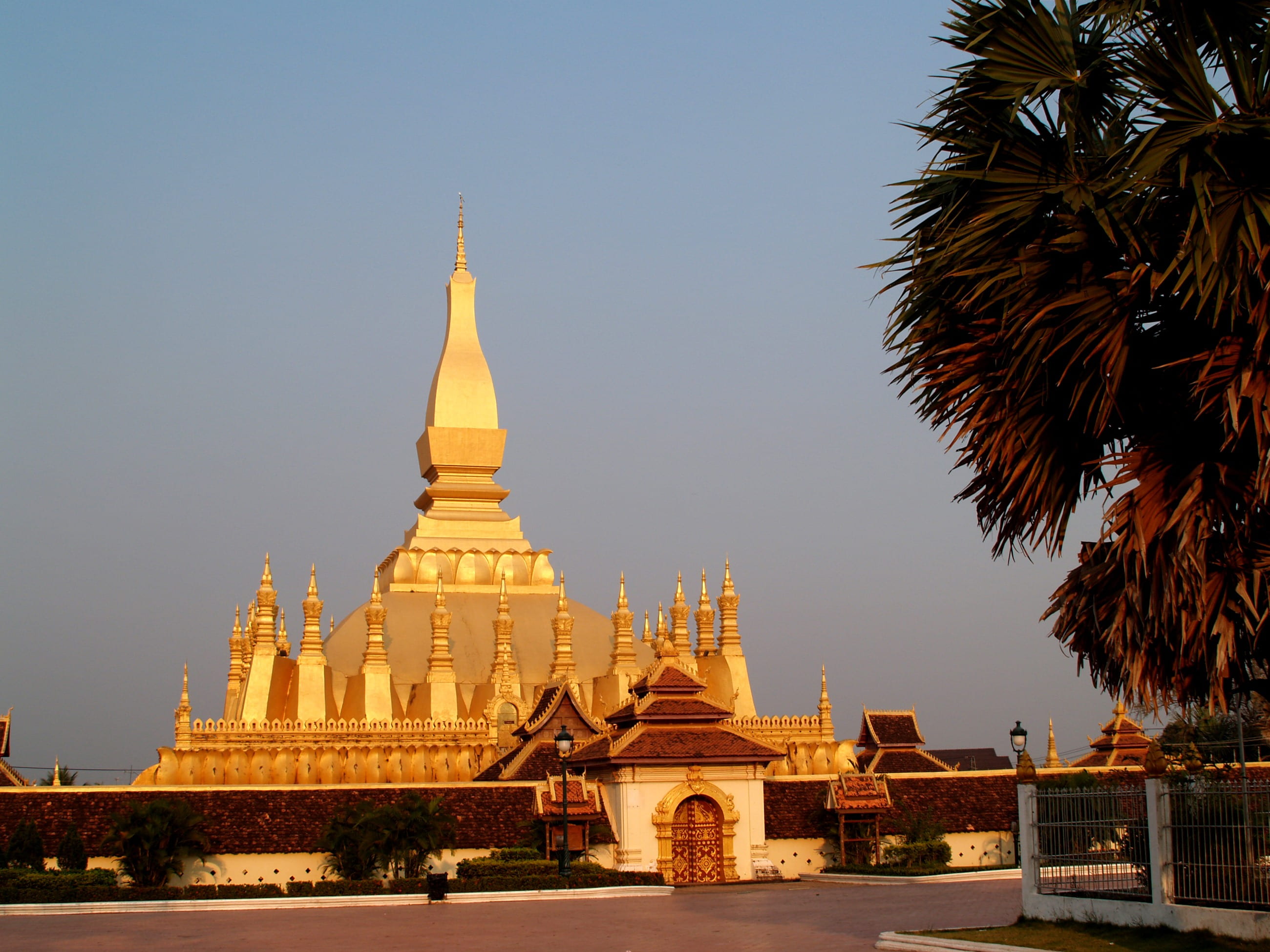 history, sky, building, clear sky, pagoda, wat pha-that luang, no people, travel destinations, religion, outdoors, spirituality, laos, gold colored, the past, HD Wallpaper