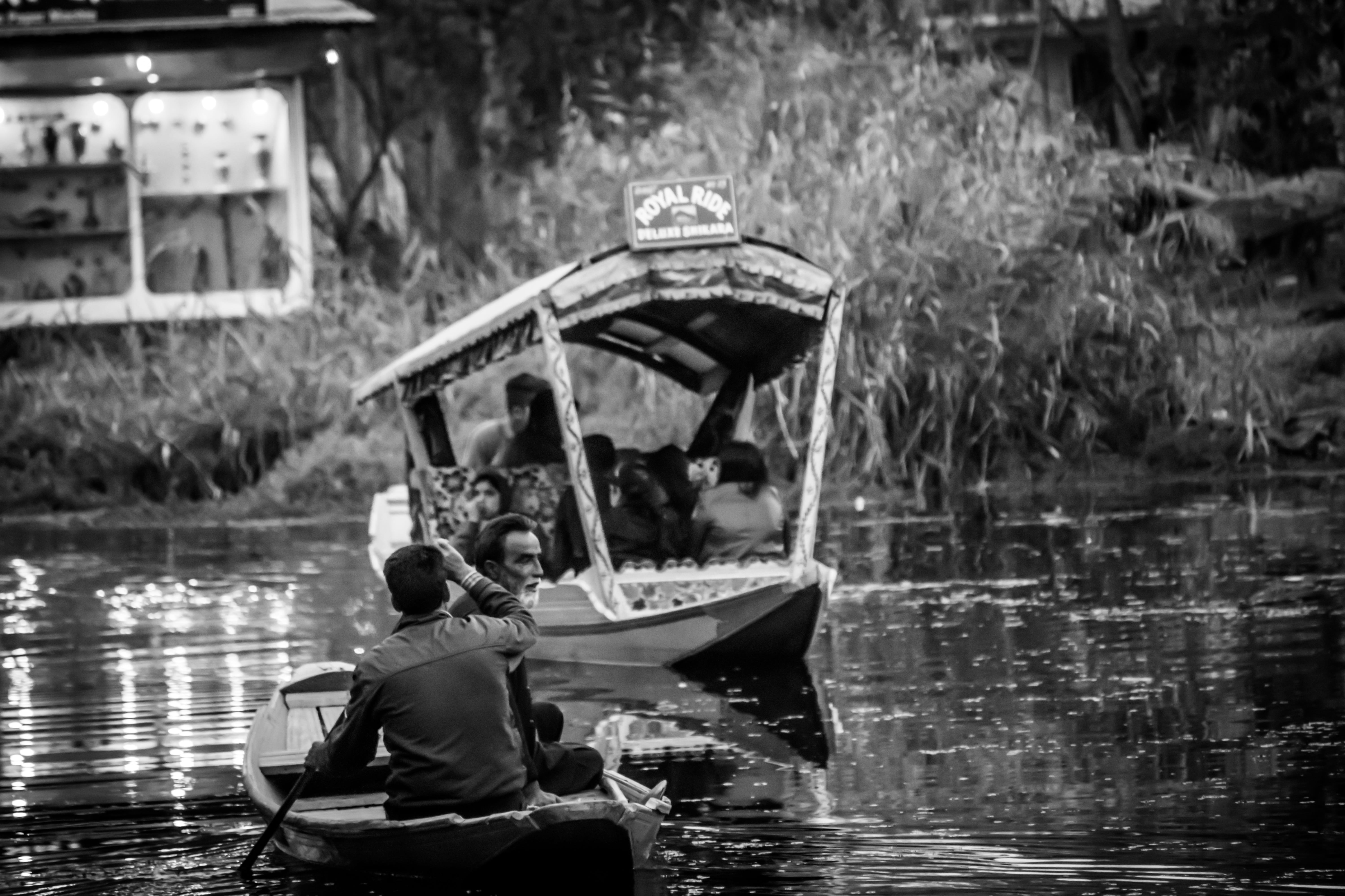 shikara, floating houses, water, nature, kashmir, floating market, floating shops, day, men, man riding boat, shops, black and white, scene, srinagar, reflection of boat in water, HD Wallpaper